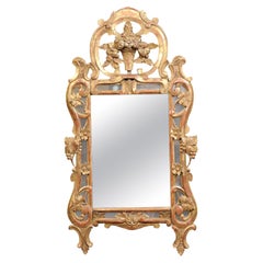 French Regence Style Giltwood Mirror with Carved Urn Crest 
Foliage Detail