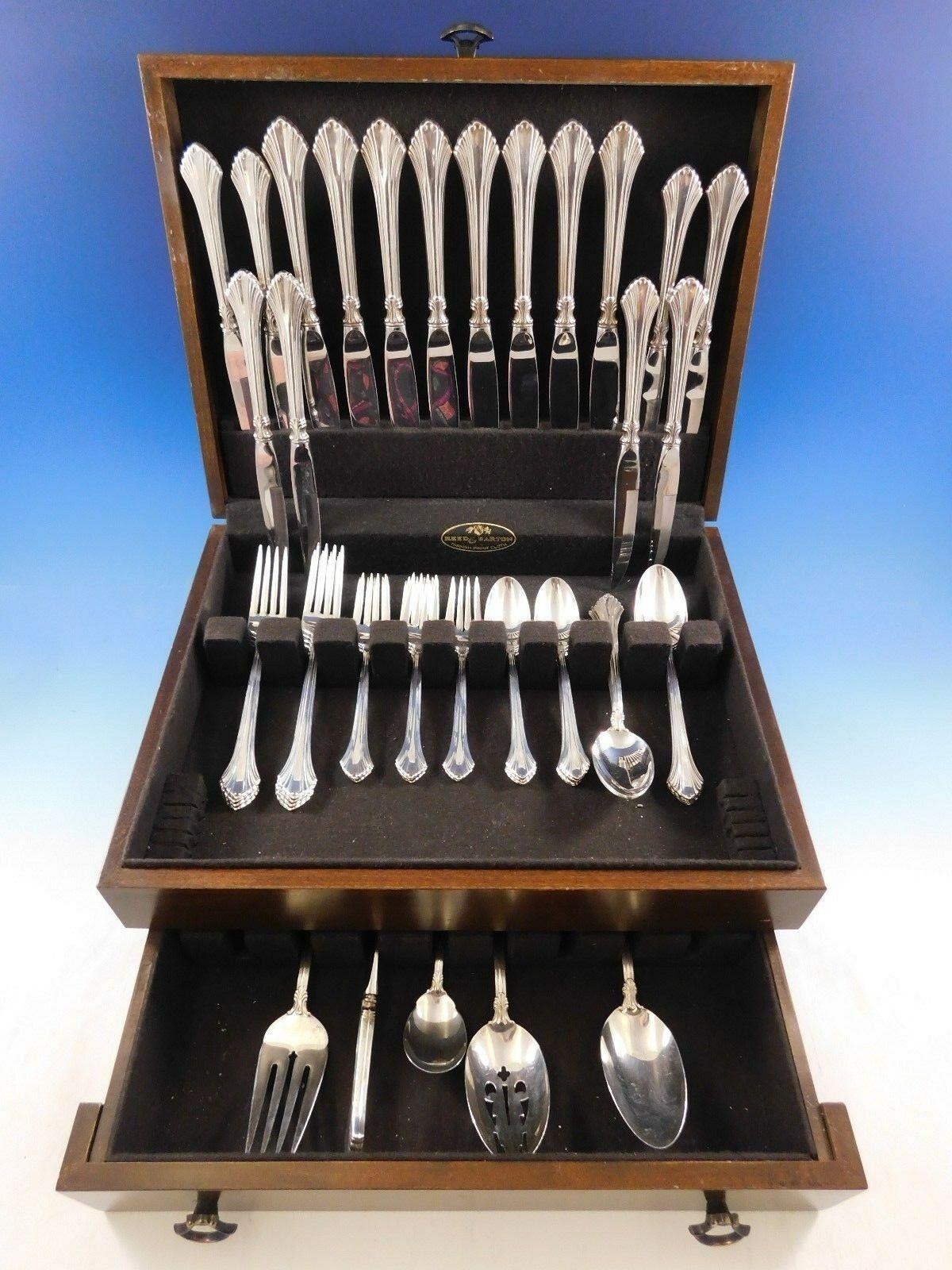 Dinner size French Regency by Wallace sterling silver flatware set, 53 pieces. This set includes:

8 dinner knives, 9 3/4