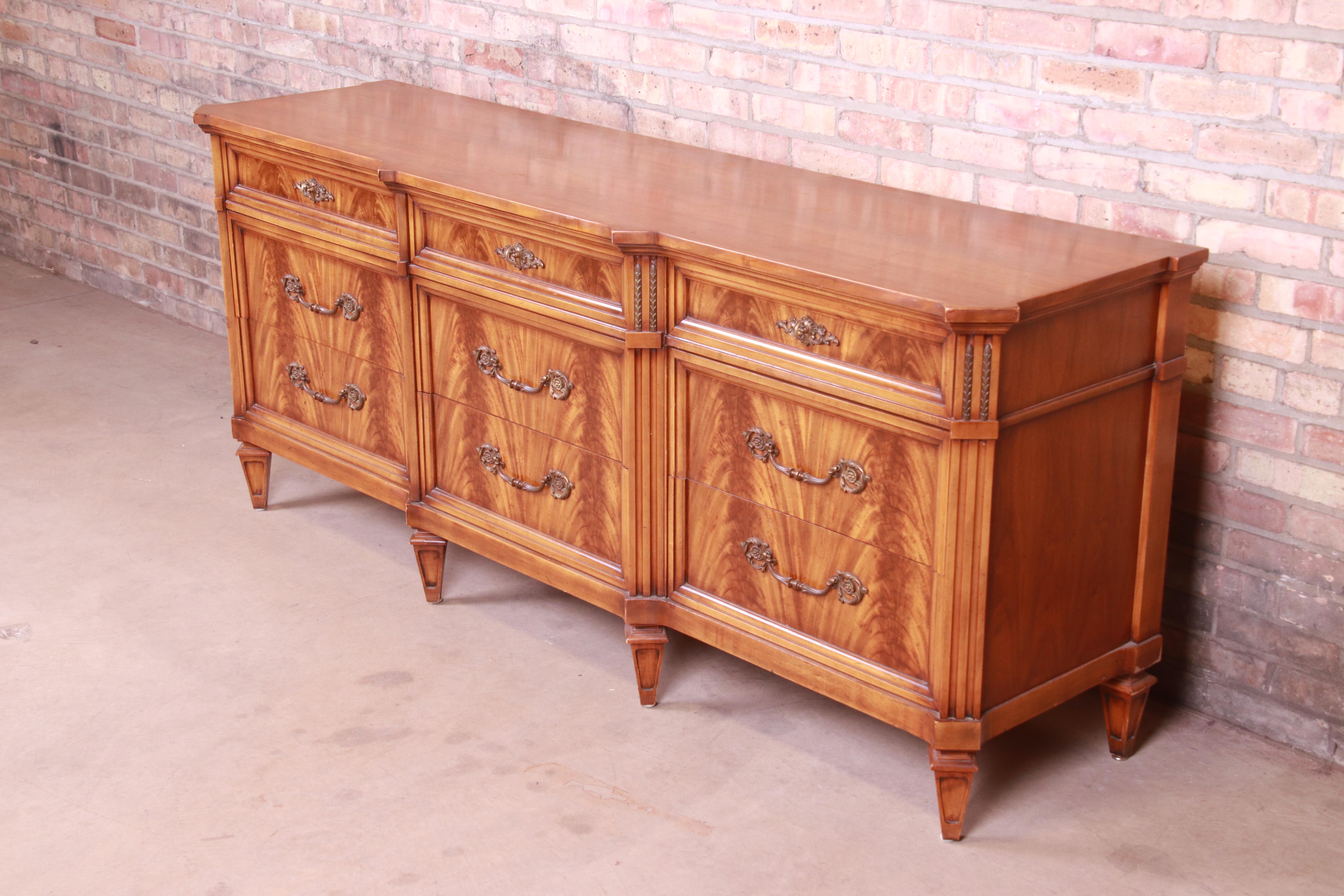 American French Regency Flame Mahogany Triple Dresser or Credenza by Metz, 1960s