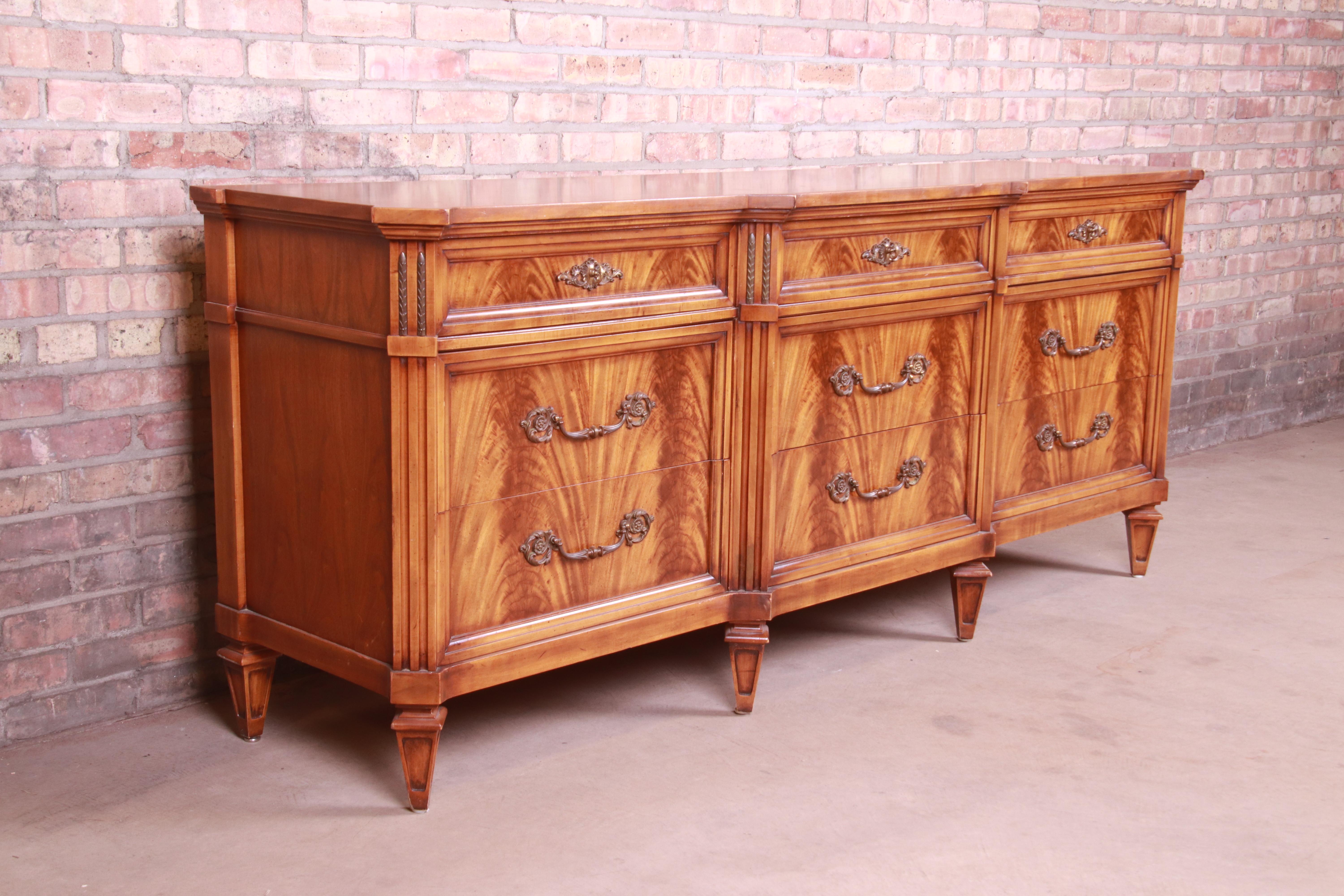Brass French Regency Flame Mahogany Triple Dresser or Credenza by Metz, 1960s