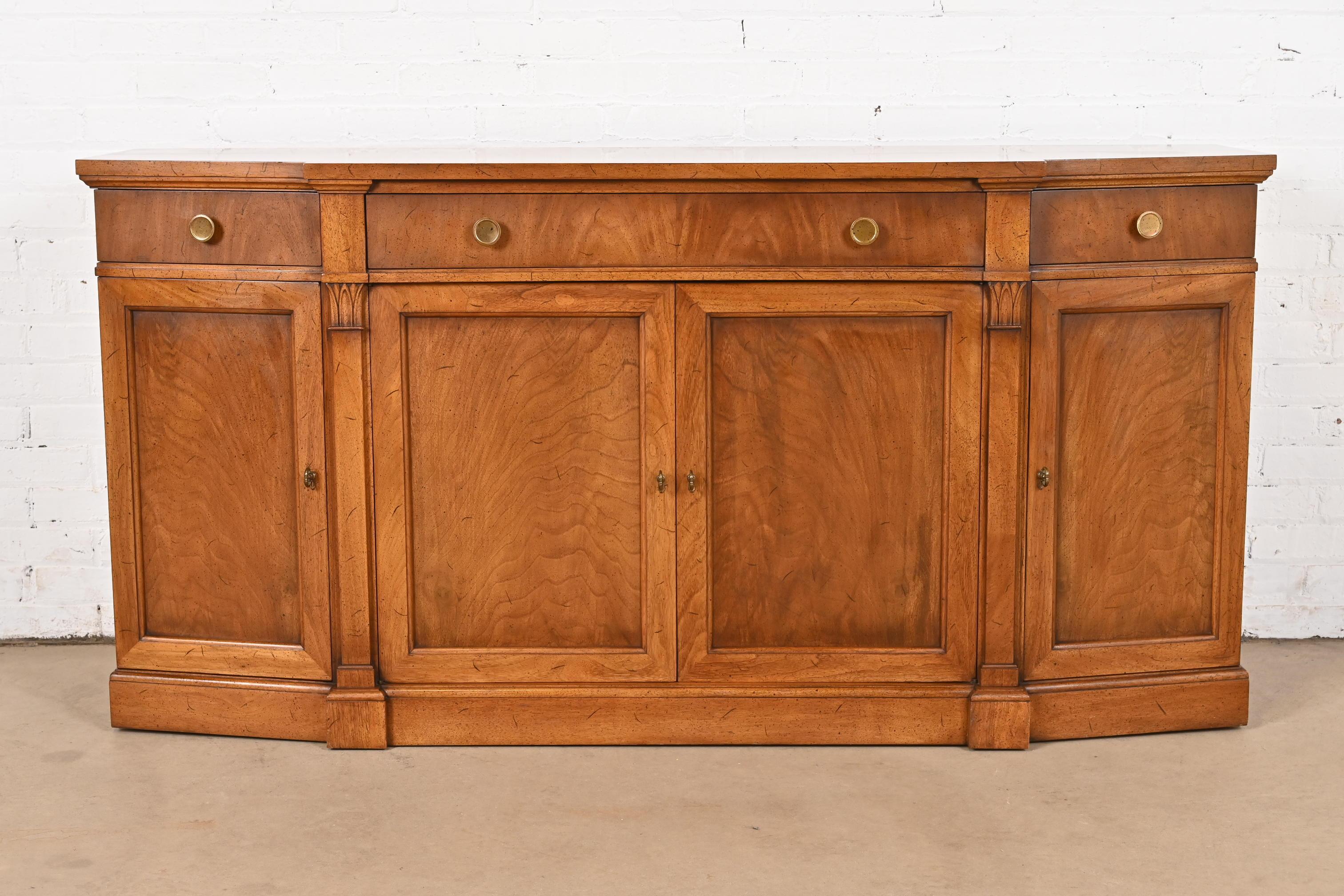 An exceptional French Regency Louis XVI style sideboard, credenza, or bar cabinet

By Mount Airy Furniture

USA, Circa 1960s

Gorgeous carved burled walnut, with original brass hardware. 

Measures: 66