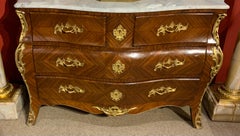 French Regency style bombe commode with white marble, ormolu mounted