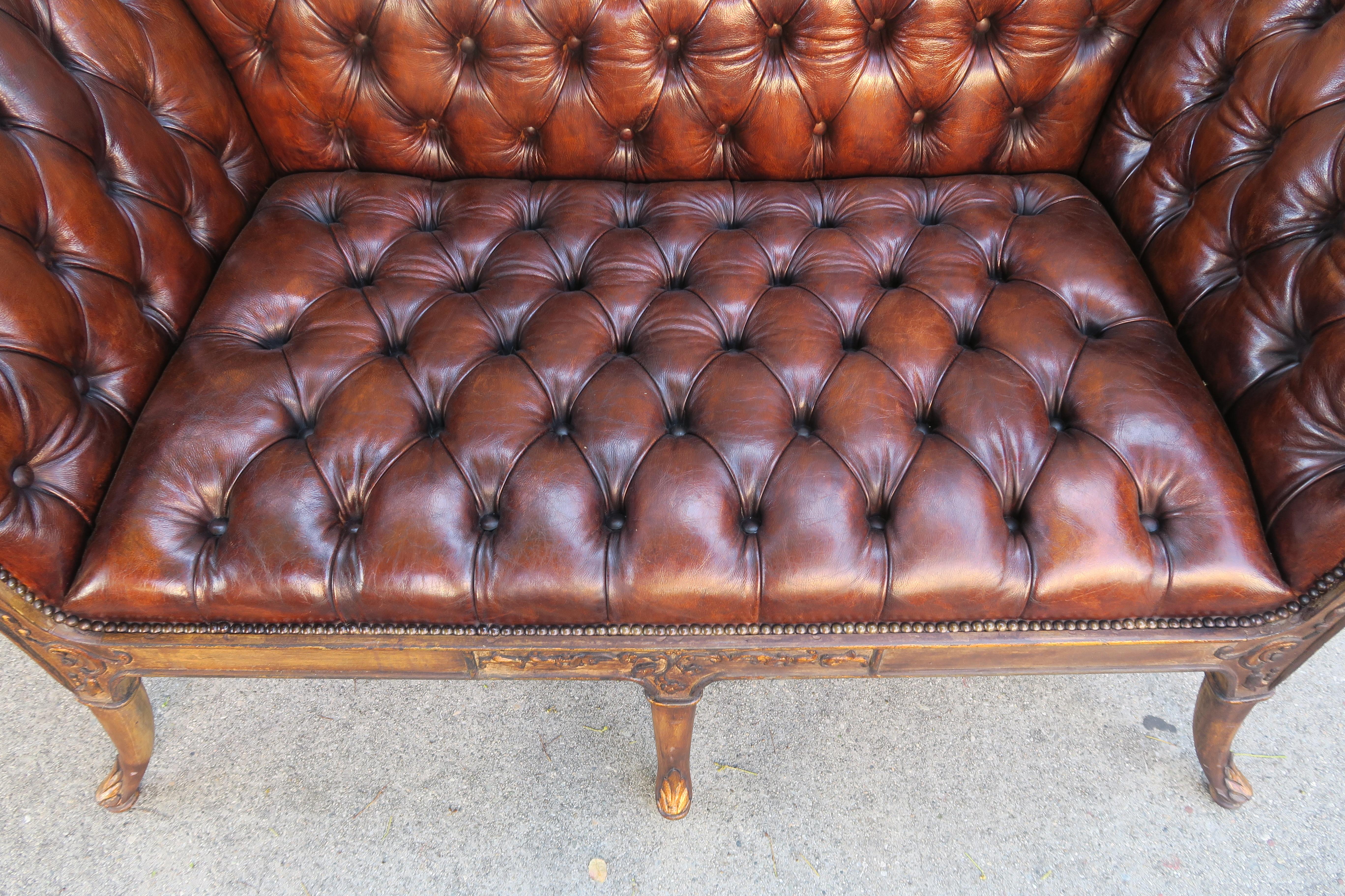 Early 20th Century French Regency Style Carved Leather Tufted Sofa, circa 1920s