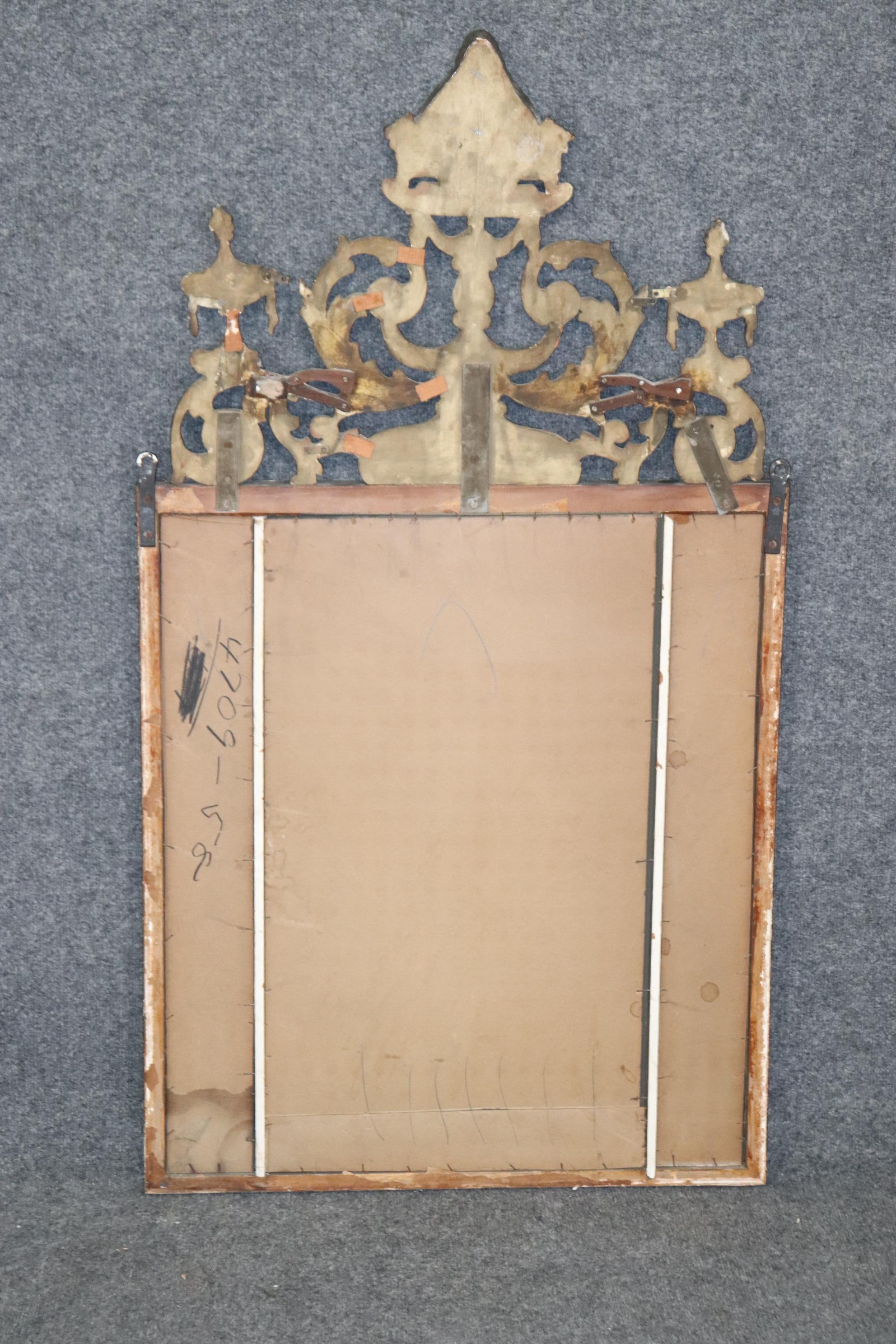 Dimensions- H:47 1/2n W: 26 1/4in D: 2in

This French Regency style carved wood and gesso mirror is made of the highest quality and is perfect for you and your home! If you look at the photos provided you'll see the detail in the carvings on the
