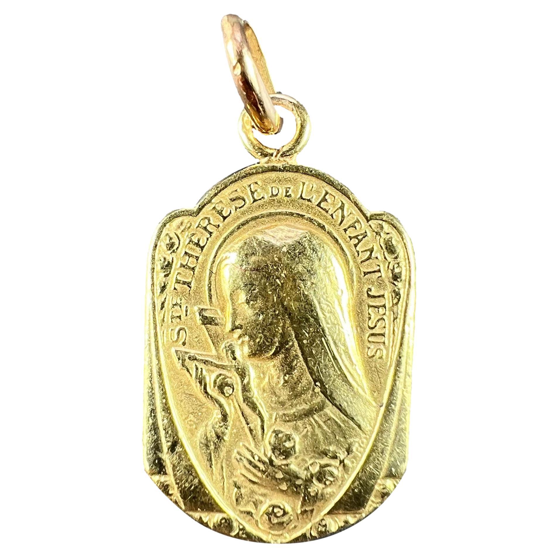 French Religious 18K Yellow Gold St Therese Charm Pendant For Sale