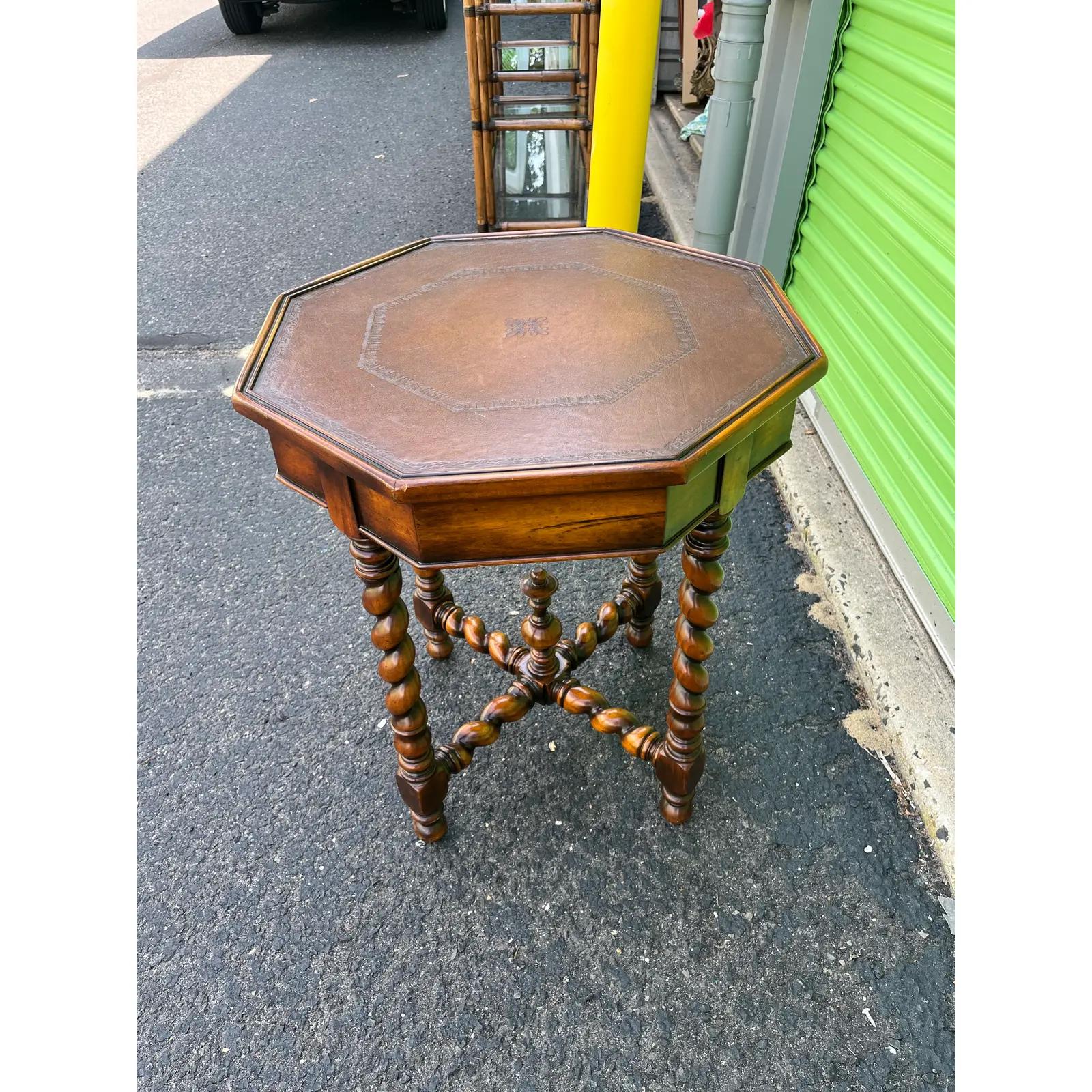 Vintage side table or nightstand with eye-catching barley twist legs and shaped stretches. Impressive final at the center of the stretchers. Embossed leather top. Single drawer.
Curbside available $350