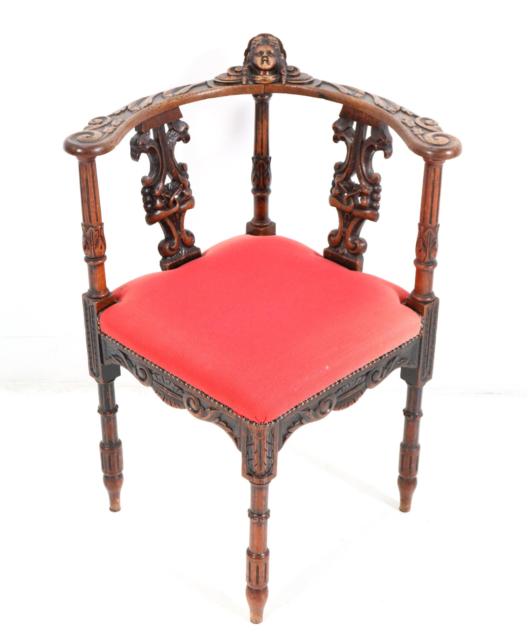 Late 19th Century French Renaissance Revival Oak Carved Corner Armchair, 1890s For Sale