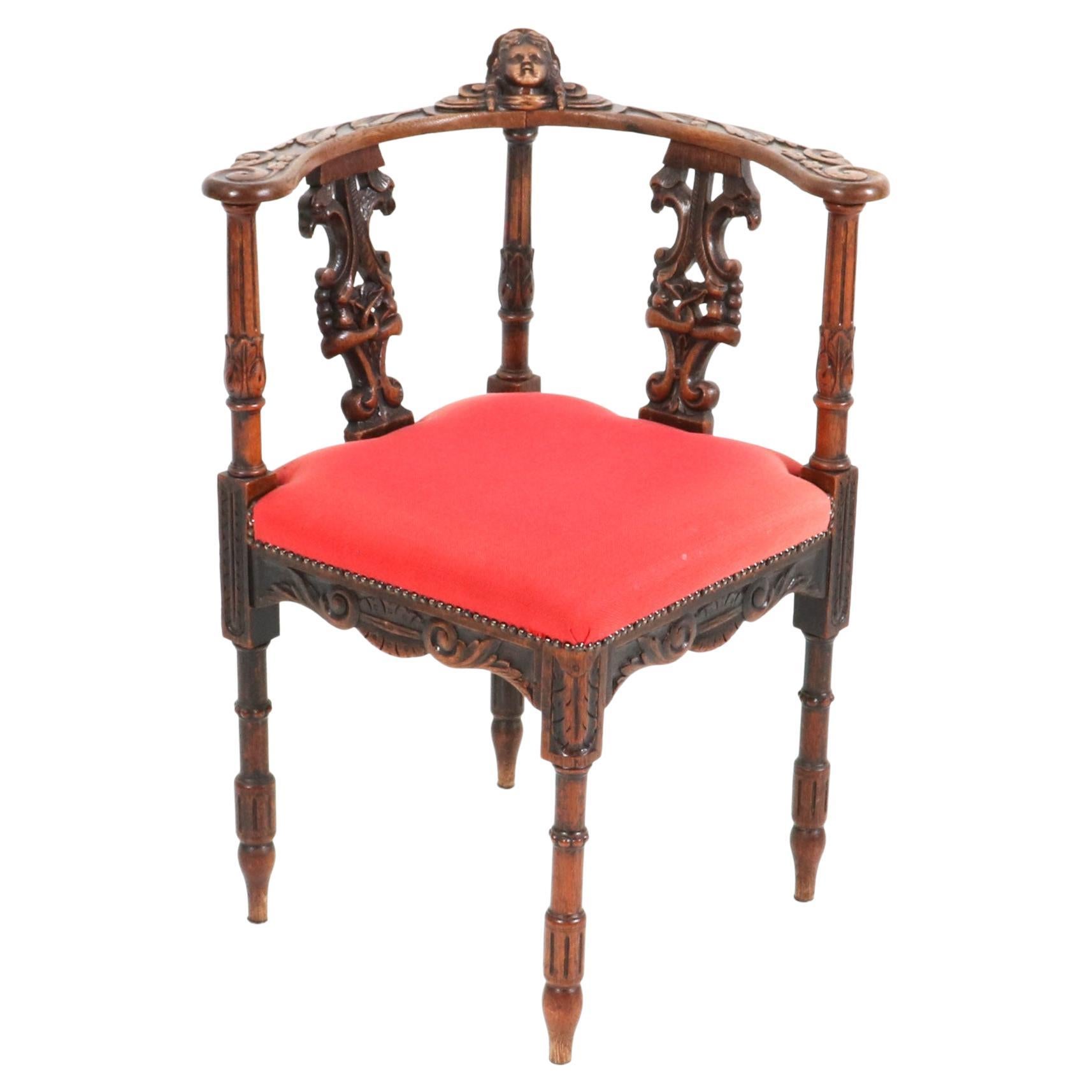 French Renaissance Revival Oak Carved Corner Armchair, 1890s For Sale