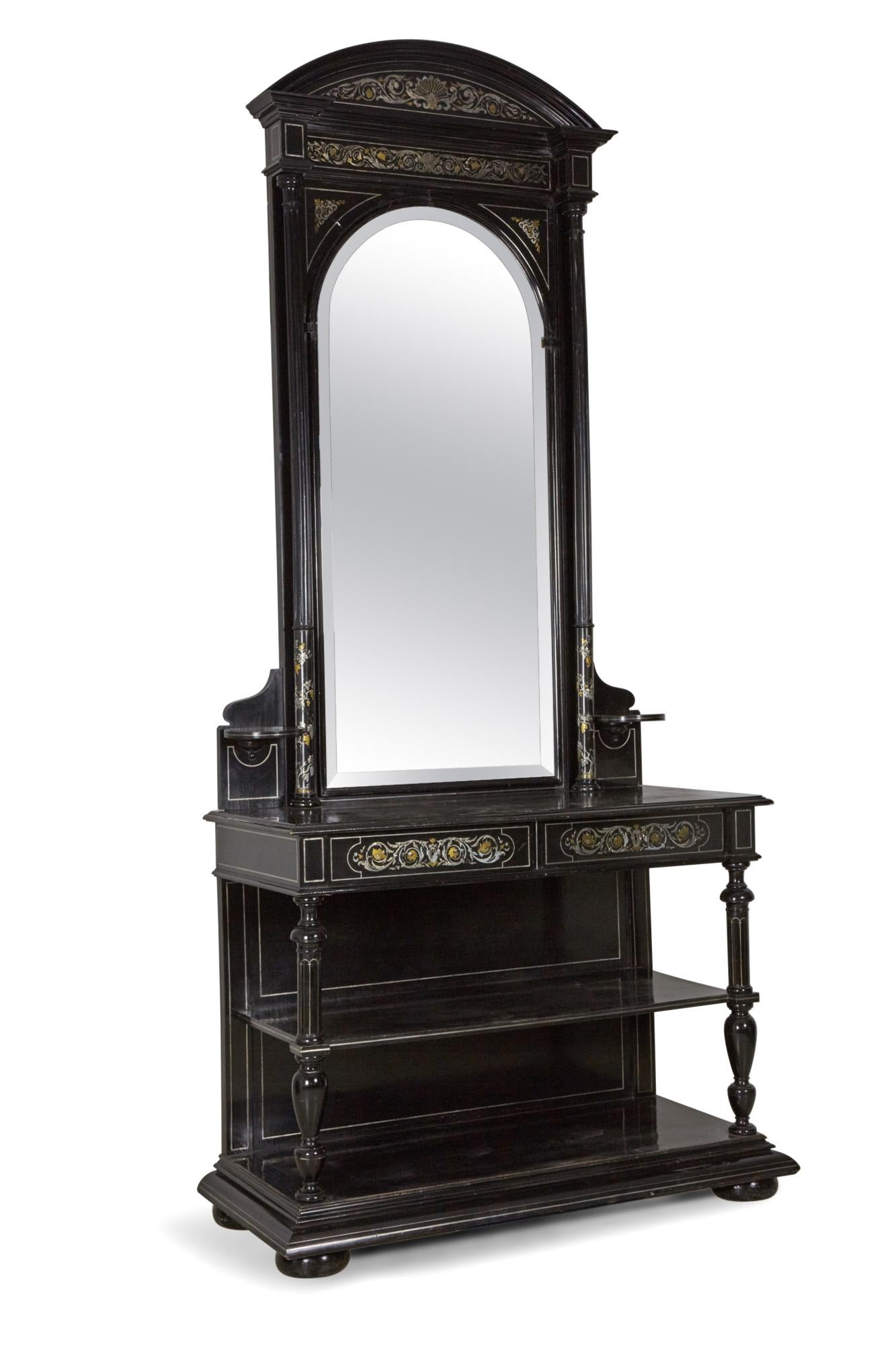 French Renaissance-style (mid-19th century) ebonized hall table/console comprised of a pier mirrored panel having an arched pediment top with two small circular shelves supported on a rectangular console table with two drawers above two open shelves