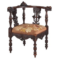 French Renaissance Style Carved Walnut Corner Armchair, Late 1800s