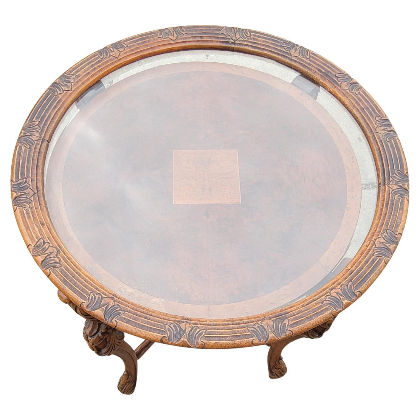 A French Renaissance style carved walnut side table with glass tray top. Glass tray removable.
Measure s23