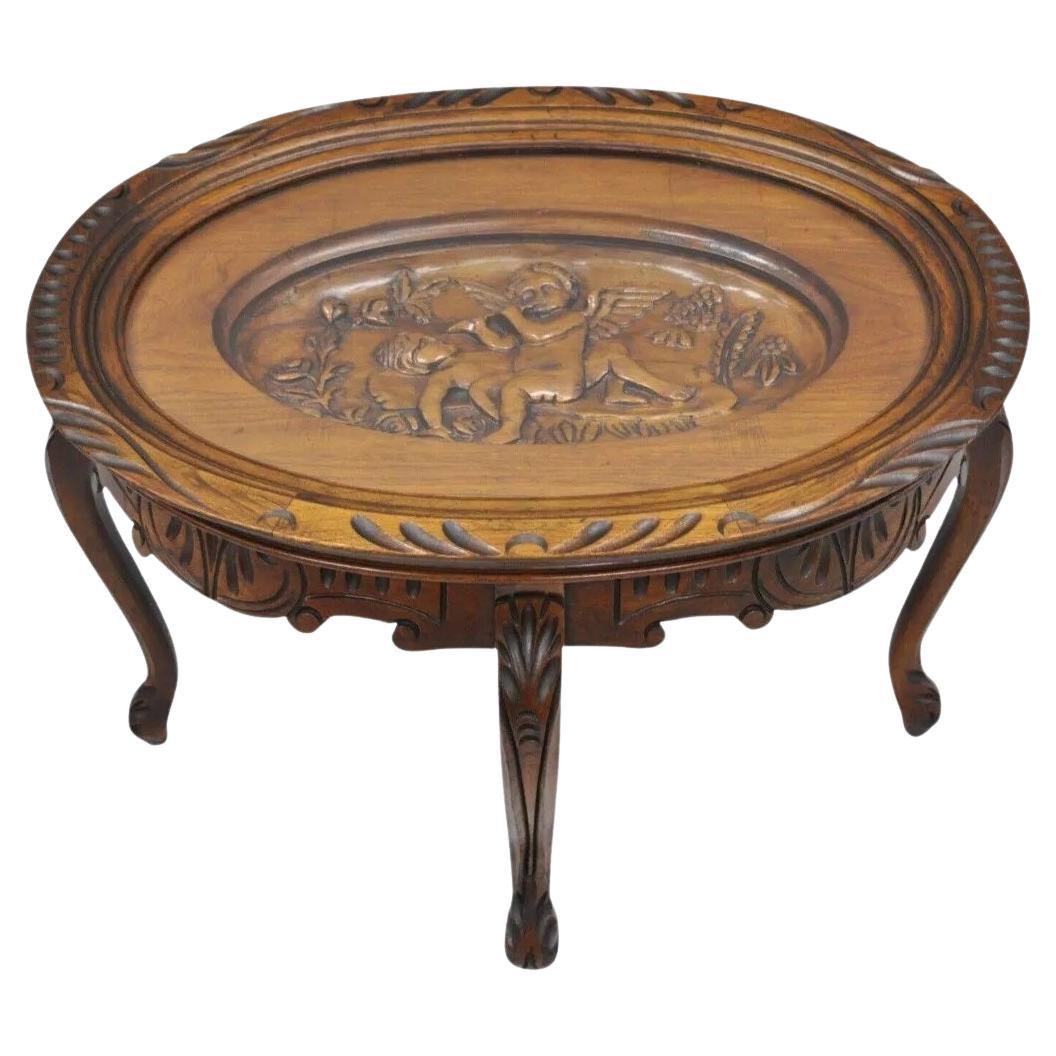 French Renaissance Style Glass Top Tray Coffee Table with Carved Cherubs Angels
