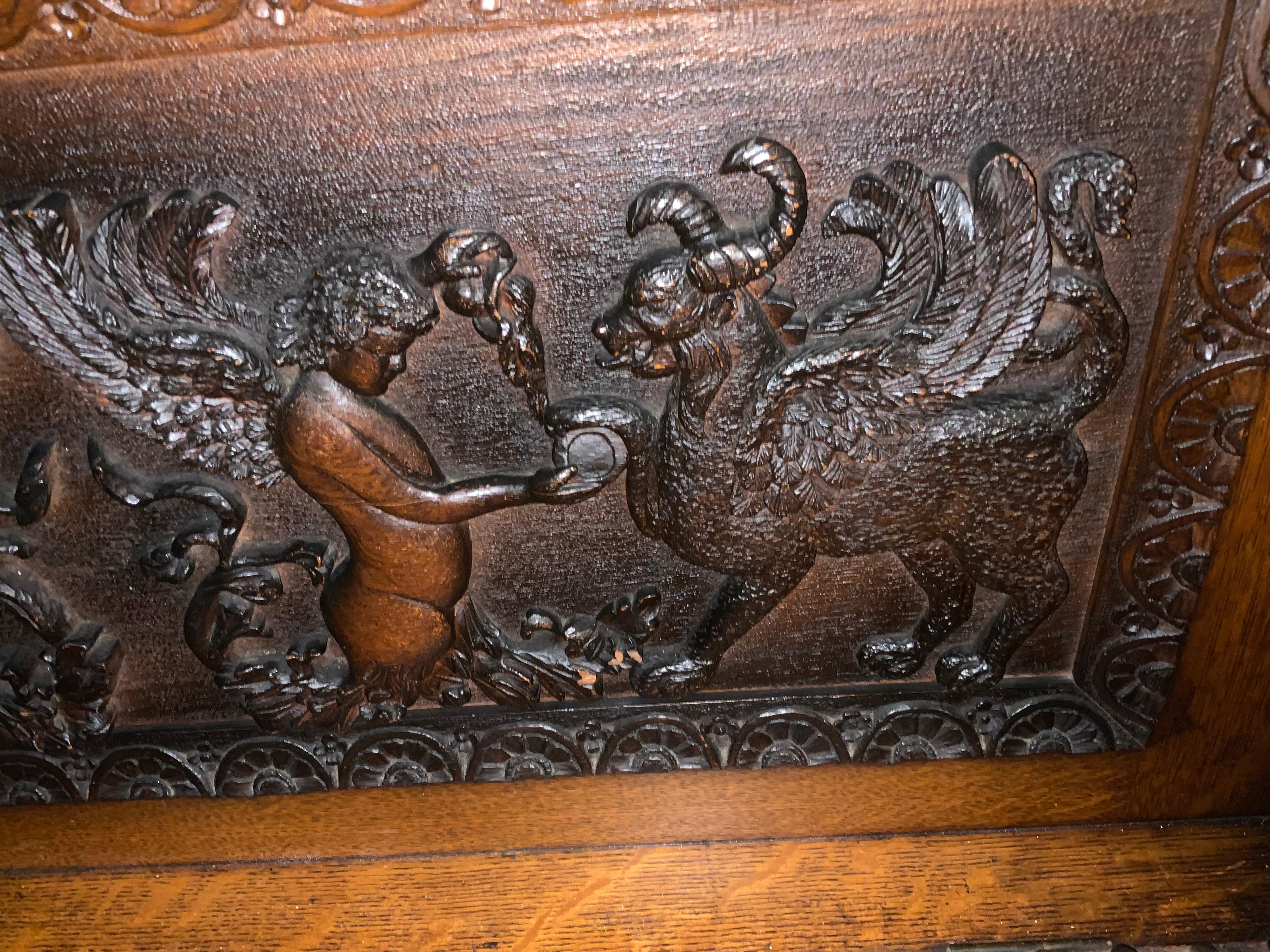 French Renaissance Style Heavily Carved Bench with Griffins and Angels 1