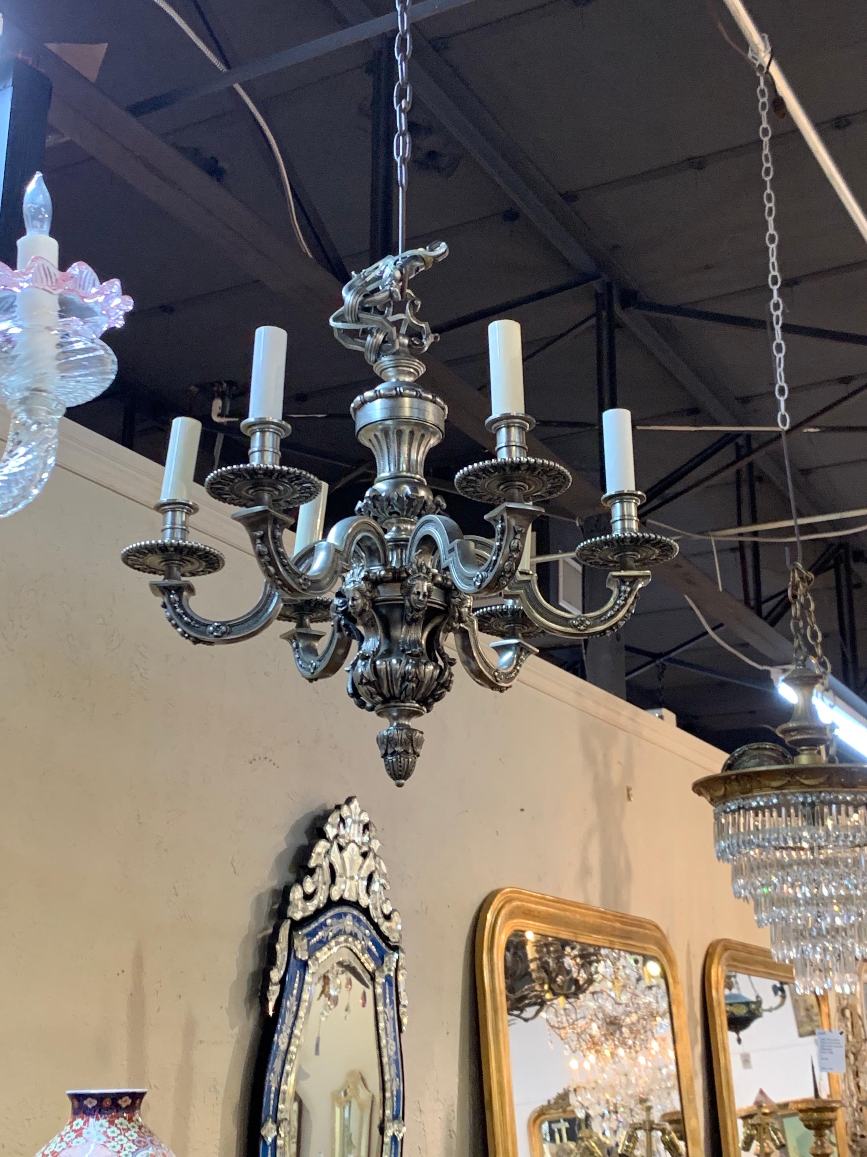 Beautiful French Renaissance style silvered bronze 6-light chandelier. Very fine details on this fixture, including faces on the lower part of the base. So interesting!