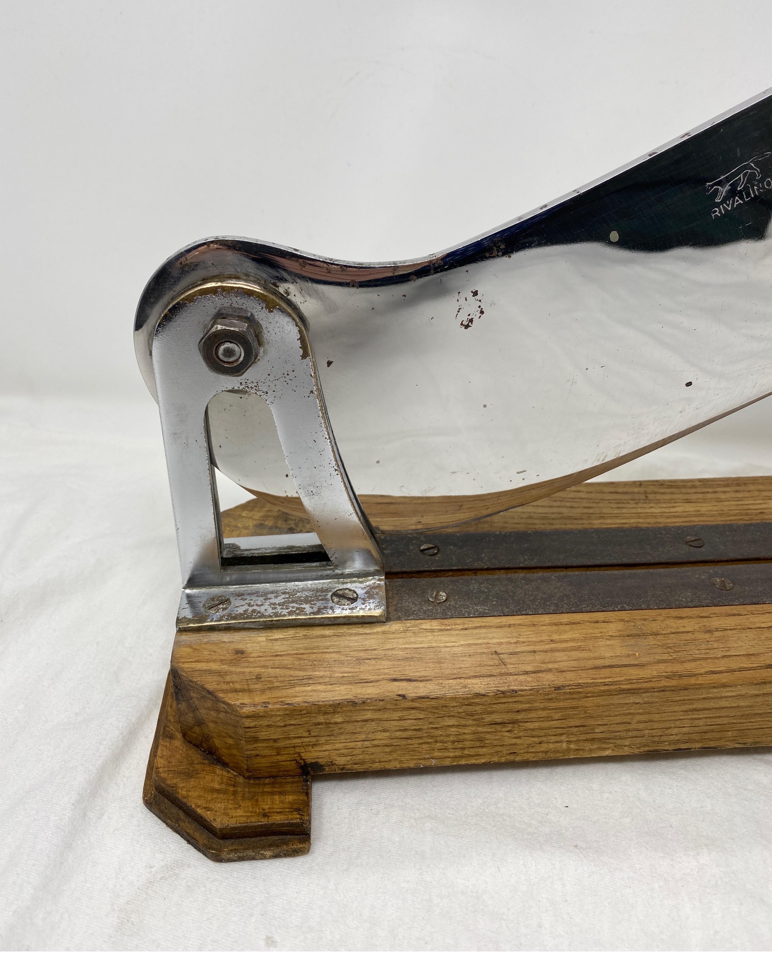 A traditional French restaurant baguette cutter. Typically found at the server's station in practically every restaurant and bistro in France. They were used to cut baguettes into the pieces served to tables and were designed so that they could cut