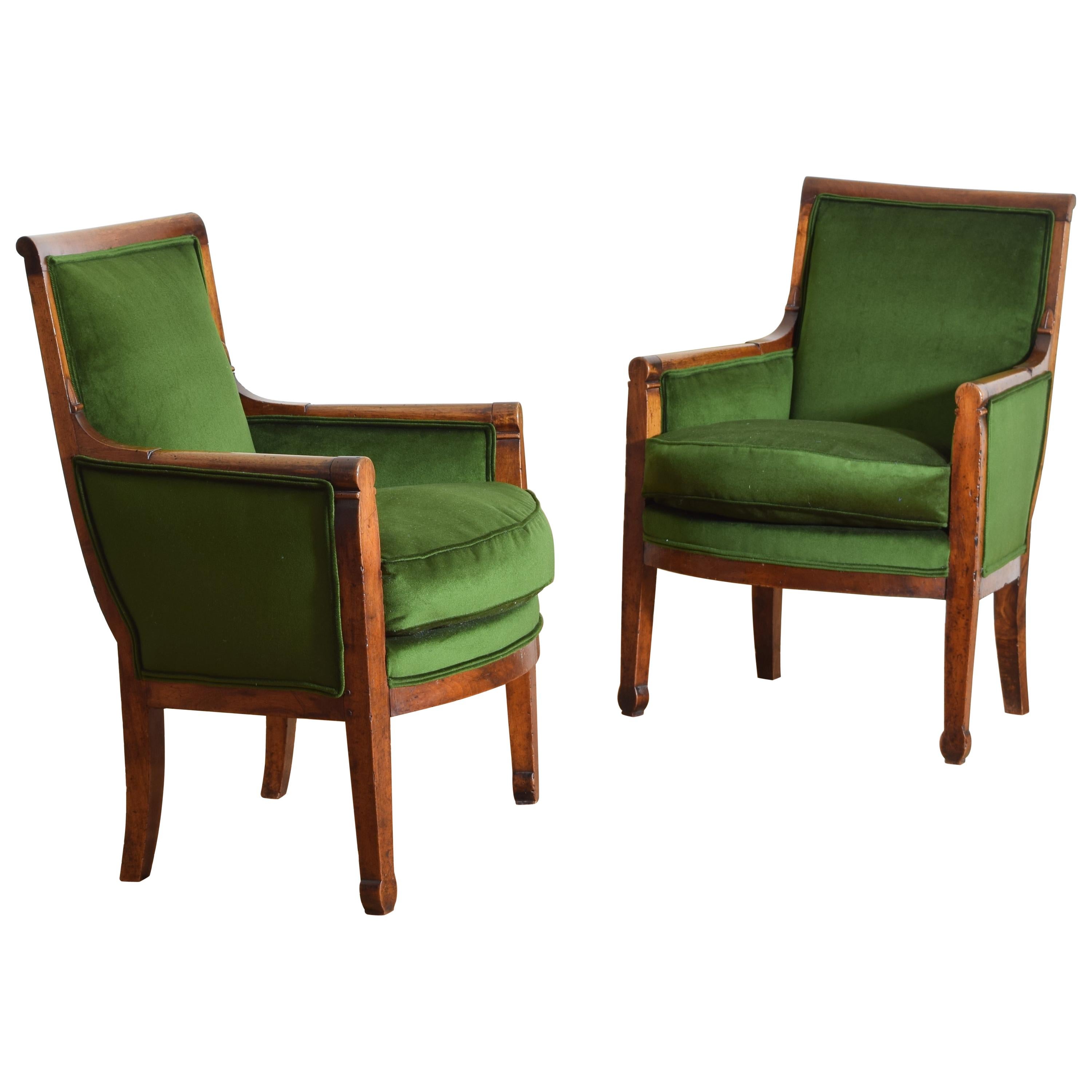 French Restauration Period Pair of Walnut and Upholstered Bergeres, circa 1825