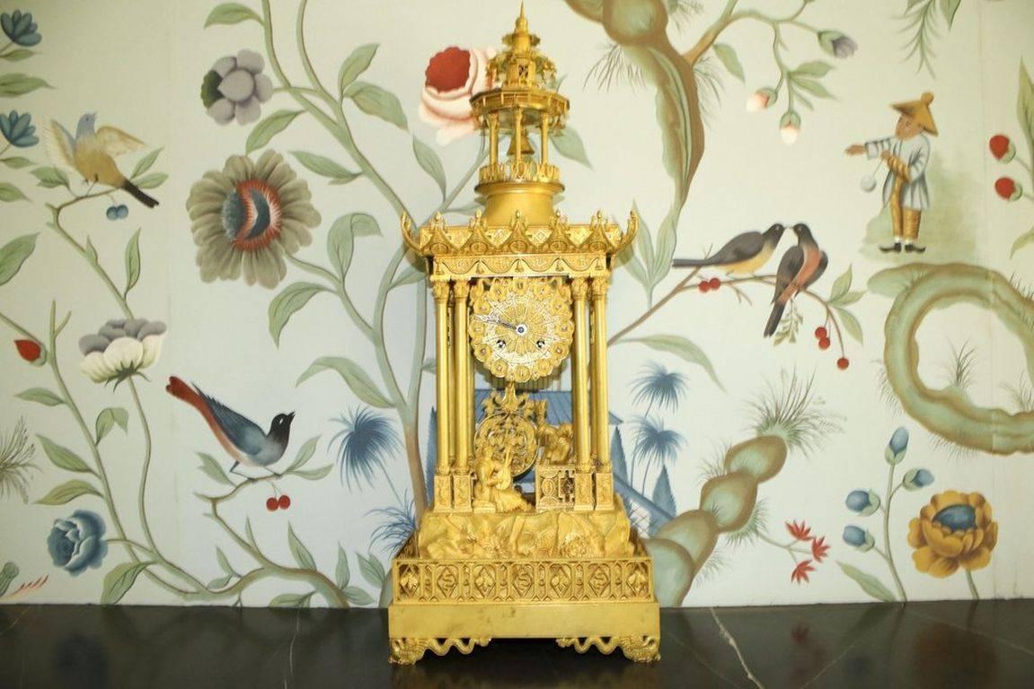 Gilt bronze French Restoration period fantasy chinoiserie mantel clock, signed 