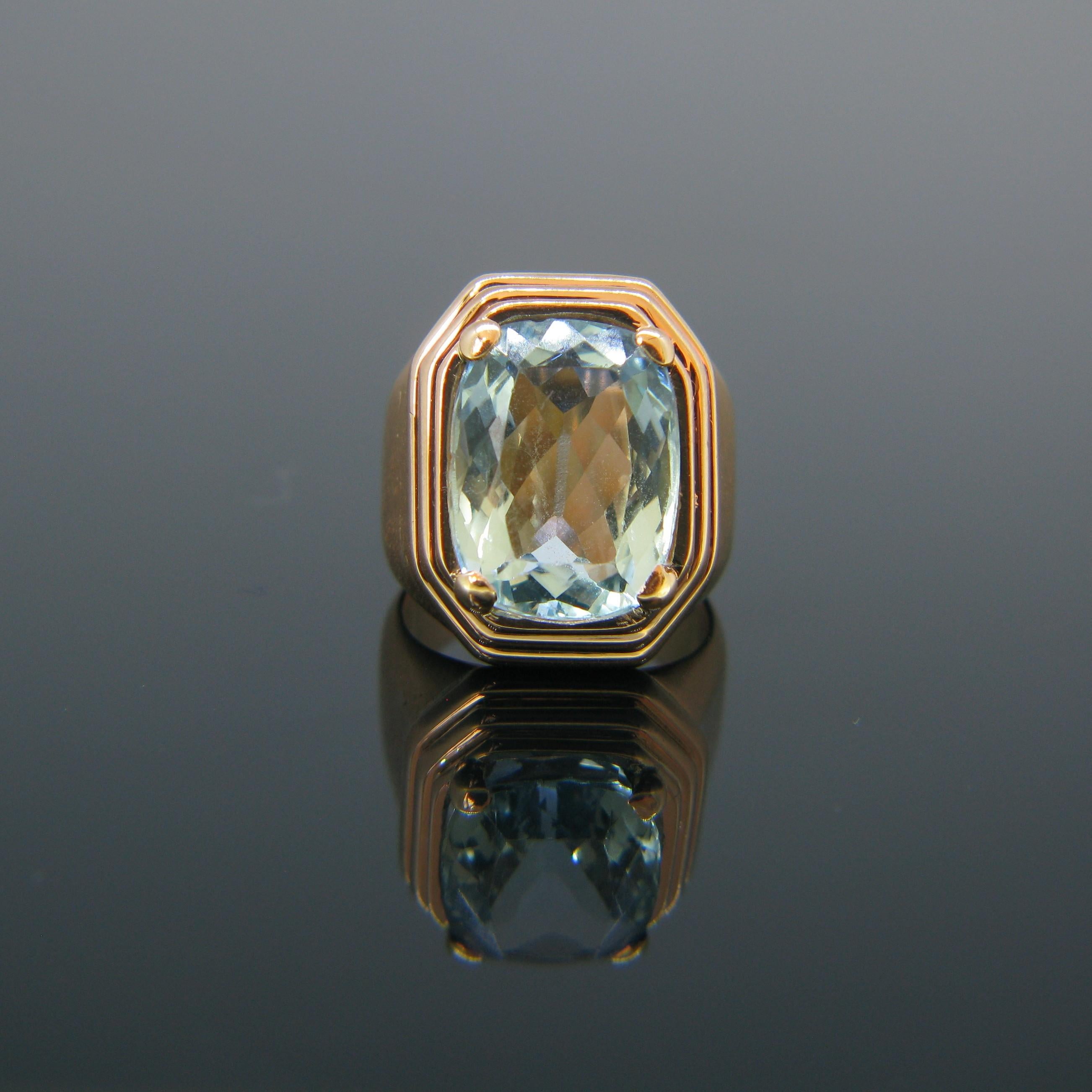 This amazing ring is set with a beautiful aquamarine of around 7.5ct. It is from the Retro era circa 1950s.  It is set in 18kt rose gold and marked with the eagle’s head. 

Circa:	Retro 1950s

Weight:	19.9gr

Metal:		18kt Rose Gold

Stones:	1