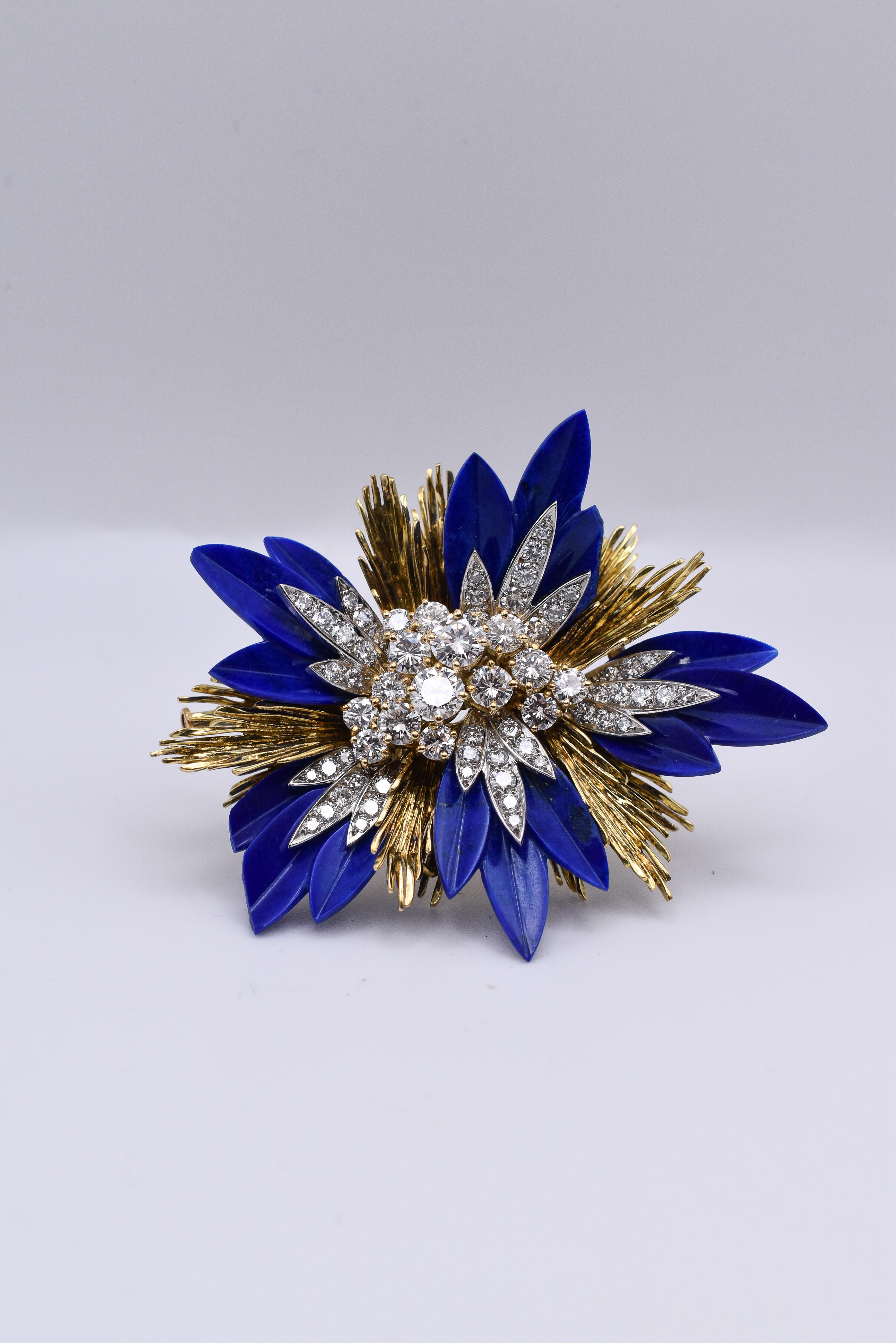 An elegant French Retro Diamond and Lapis Lazuli Brooch mounted in 18k Yellow Gold. Made in France, circa 1960.

Max Width: 67mm
Gross weight: 45 grams