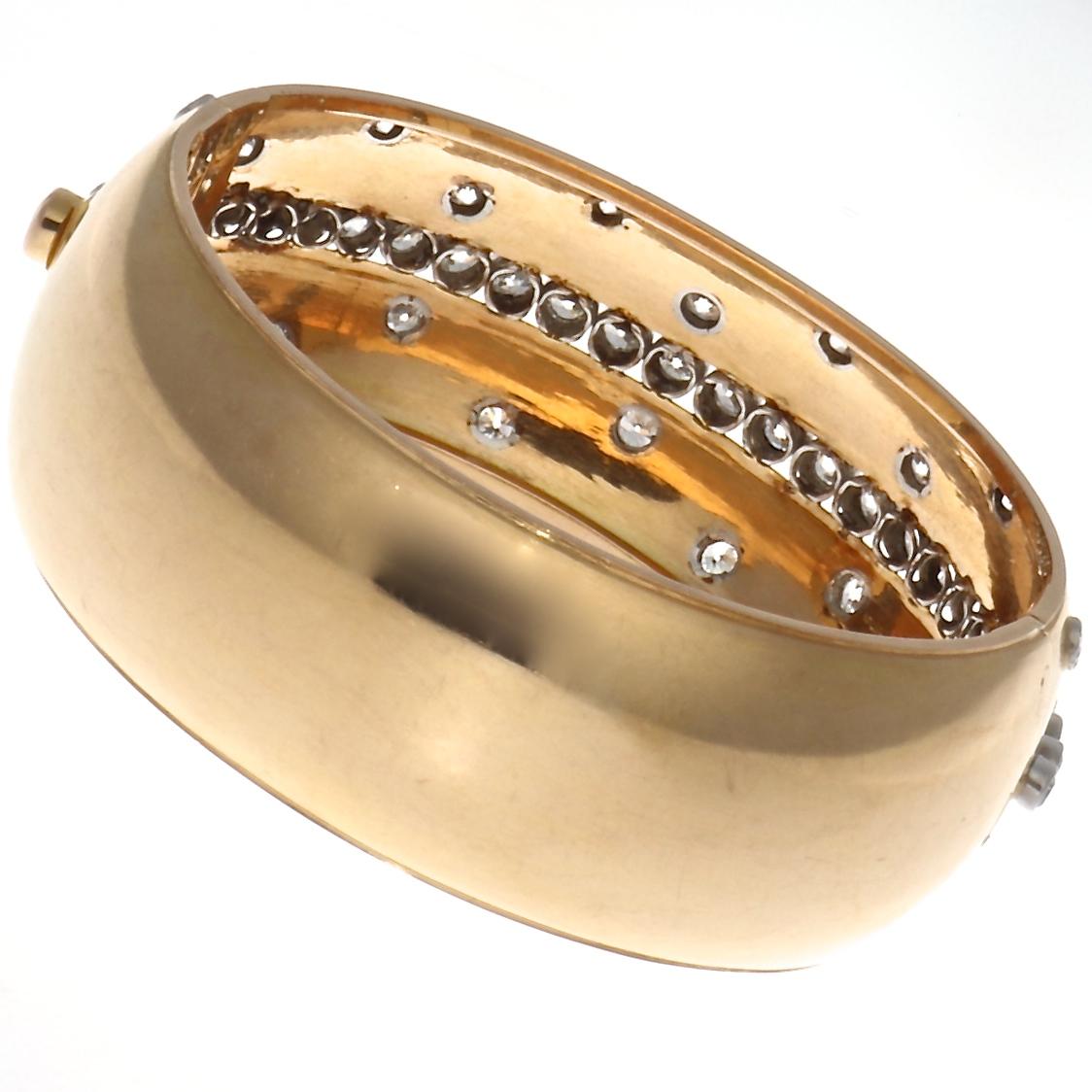 French retro 18k yellow gold and diamond bracelet, consisting of 48 old European cut diamonds, approximately 7 carats total weight, G-H color SI clarity. A fabulous display of well placed diamonds on this (inch wide) hinged bangle from 1940's