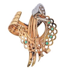 French Retro Emerald Diamond Gold brooch by

Mauboussin