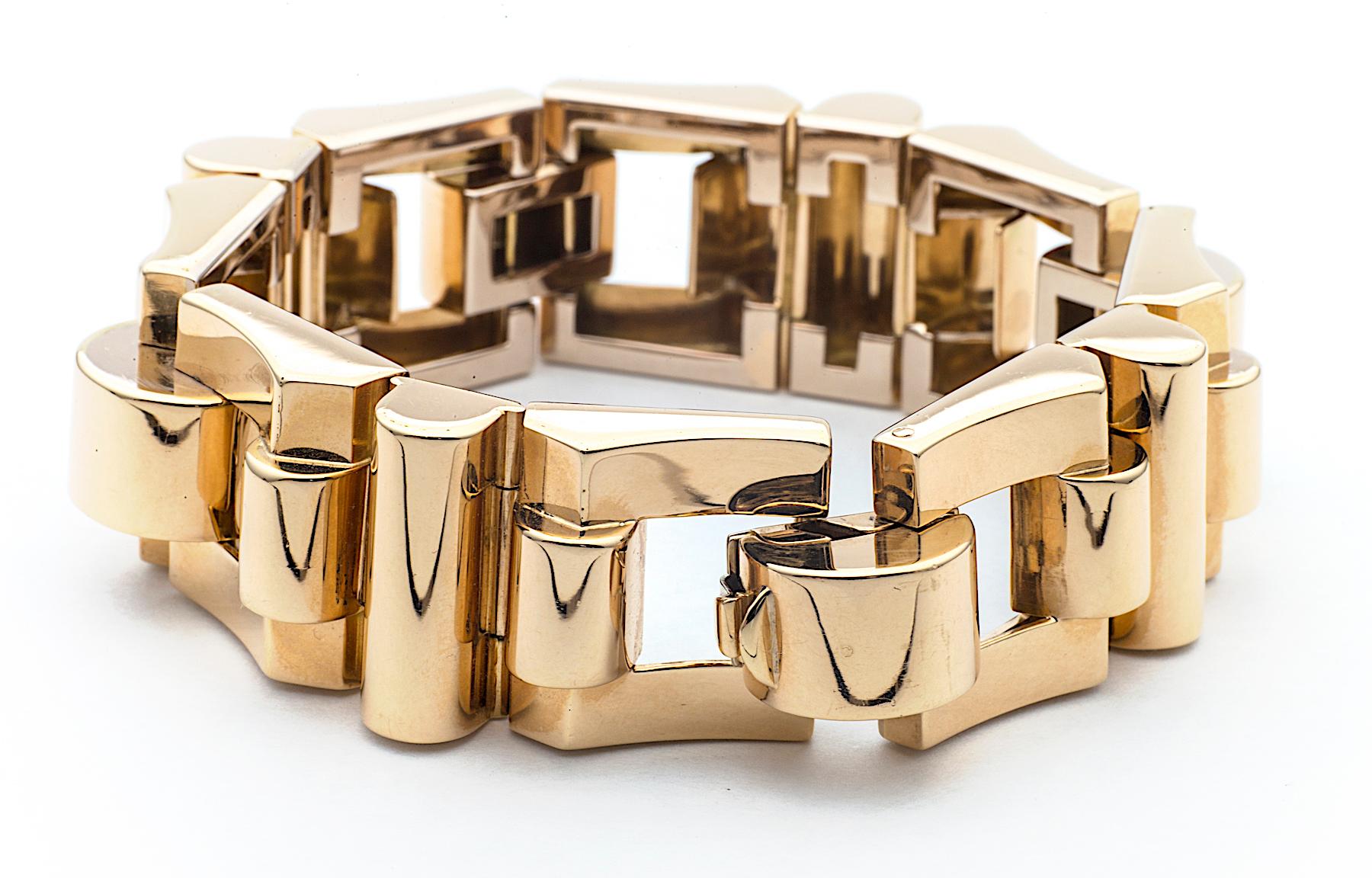 
This machine age retro link bracelet, circa 1945, reflects how jewelry makers after World War II were inspired to create heavy geometric designs that paid homage to the monumental equipment used to win the war.  With a one-of-a-kind design