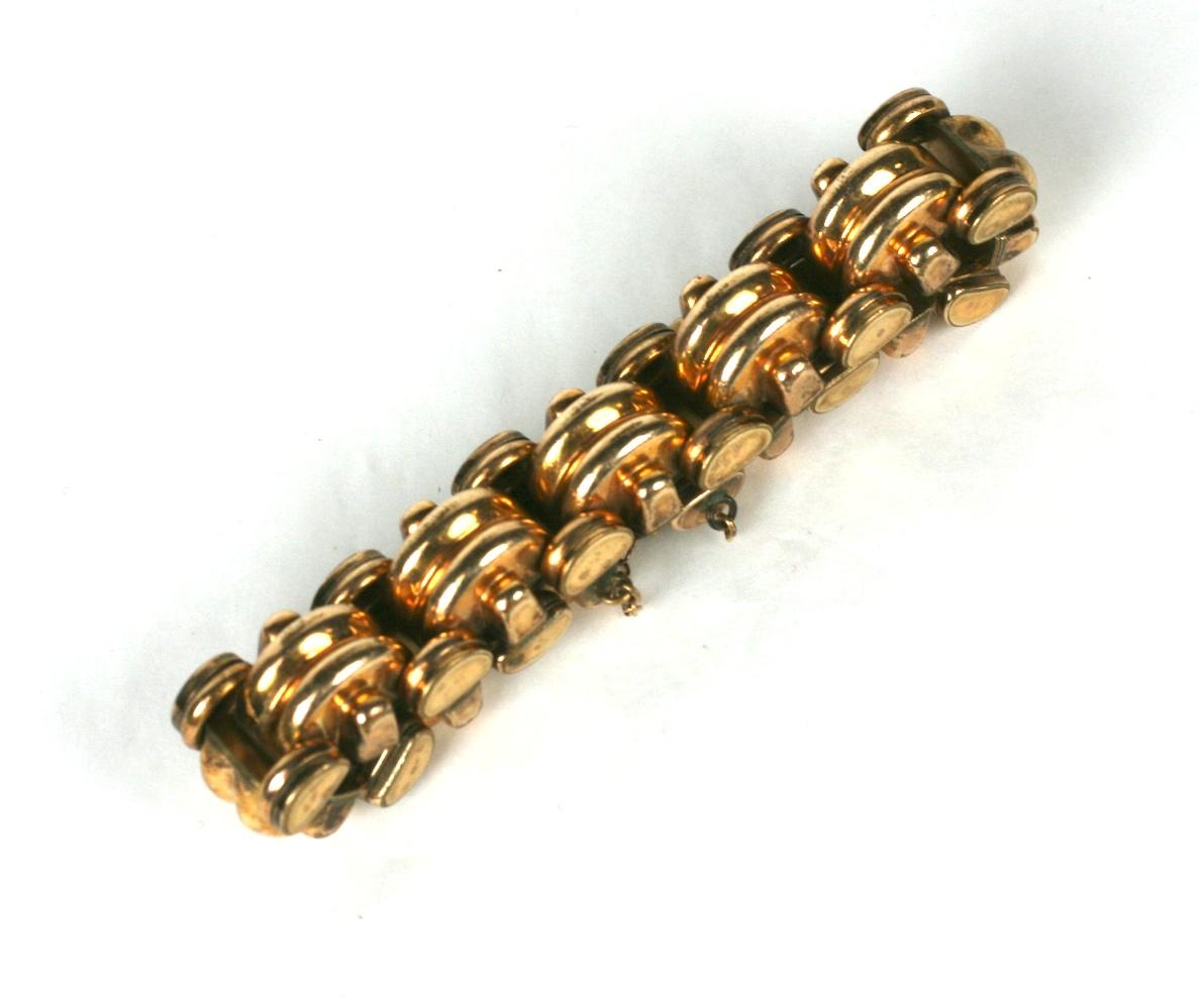 French 1940s articulated retro link bracelet of gilded ribbed and smooth tank links.
Safety guard chain, 1940's France. 
Length 6.50