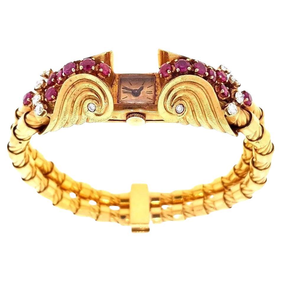 Montre-bracelet rétro française en or rose 18 carats avec rubis et diamants en vente