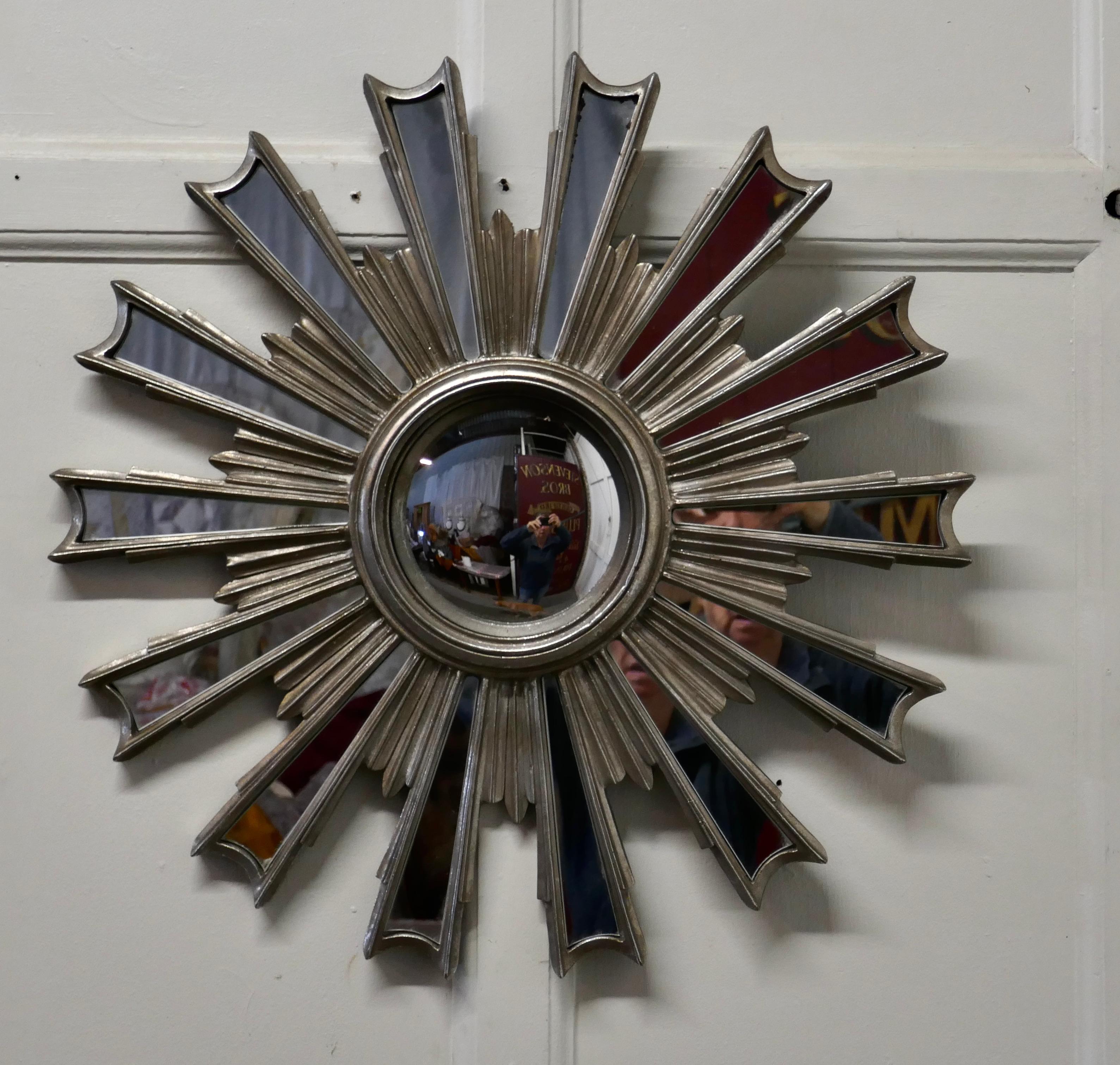 French Retro Sunburst Industrial Look Polished mirror

A Superb stylish piece, the starburst radiates out from the central mirror, the rays are individually mirrored

A Classic from the 20th century, an attractive statement piece
The Starburst