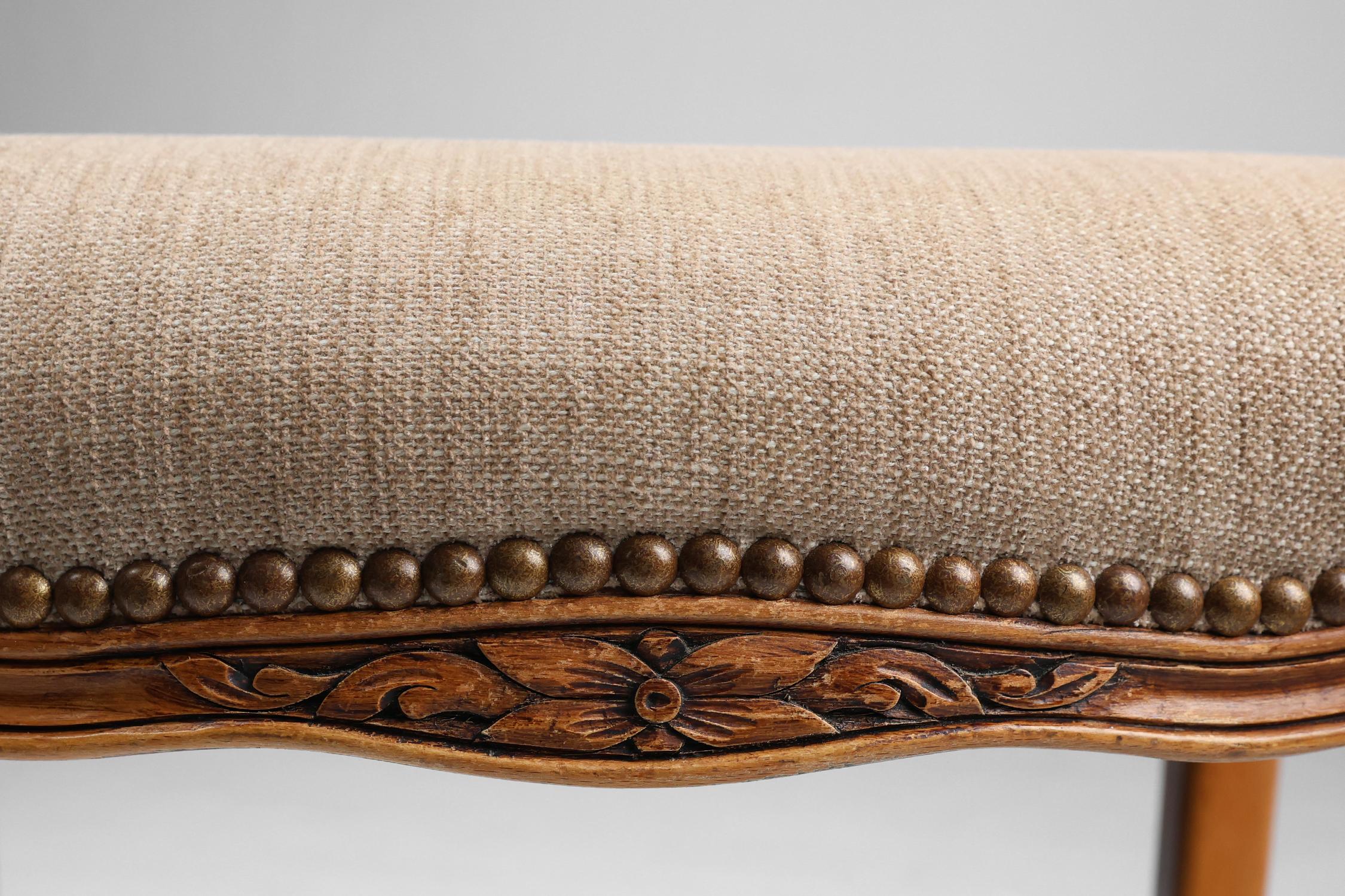 French reupholstered Louis XV style footstool in carved wood 1