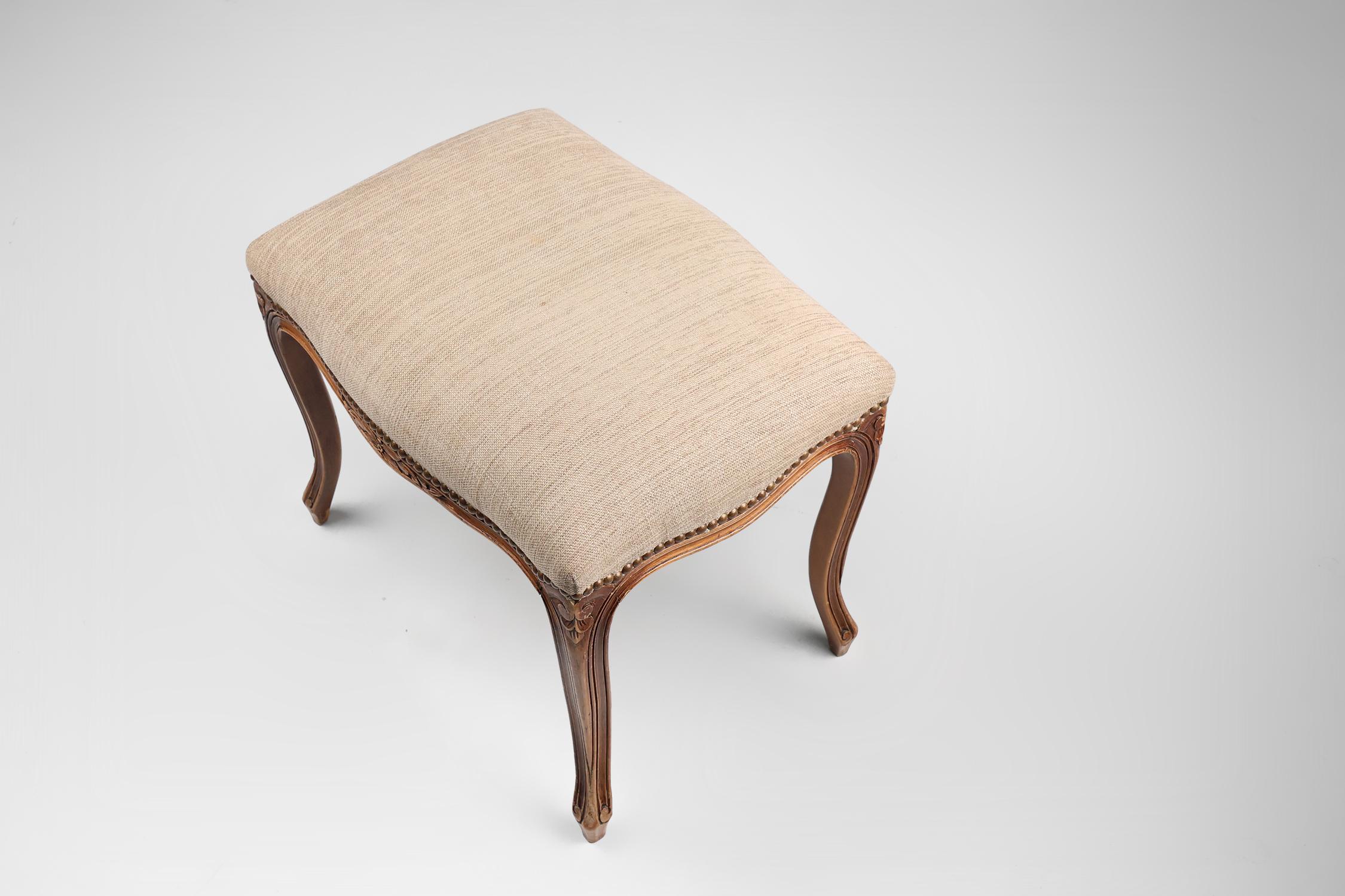 French reupholstered Louis XV style footstool in carved wood 2