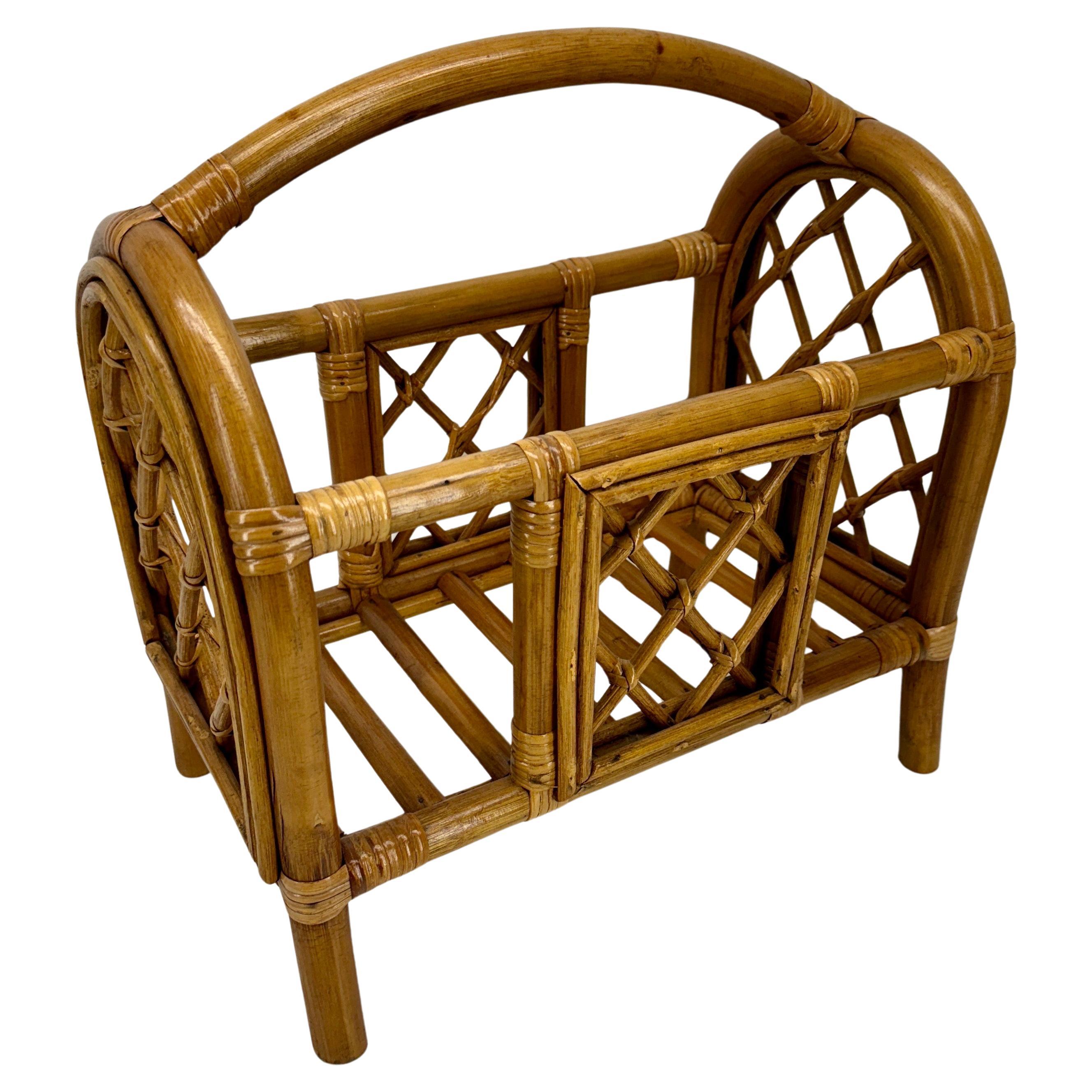 Sturdy and classy magazine rack in thick bamboo and made in France in the 1960´s.

Handmade by flexing thick bamboo and rattan canes, this vintage magazine holder will hold many magazine and books. The rack is en very good vintage condition.

 