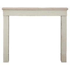 Cheminée Bastide de la Côte d'Azur en pierre calcaire beige pour une décoration intemporelle