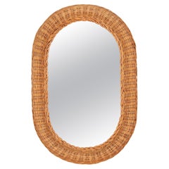 Miroir ovale du milieu du siècle en osier de rotin tressé de la Côte d'Azur, Italie, années 1970
