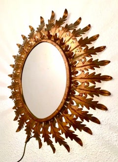 French Riviera lighting mirror with light gold metal brutalist , 1960s