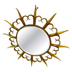 French Riviera mirror with light gold metal hollywood regency , 1950s