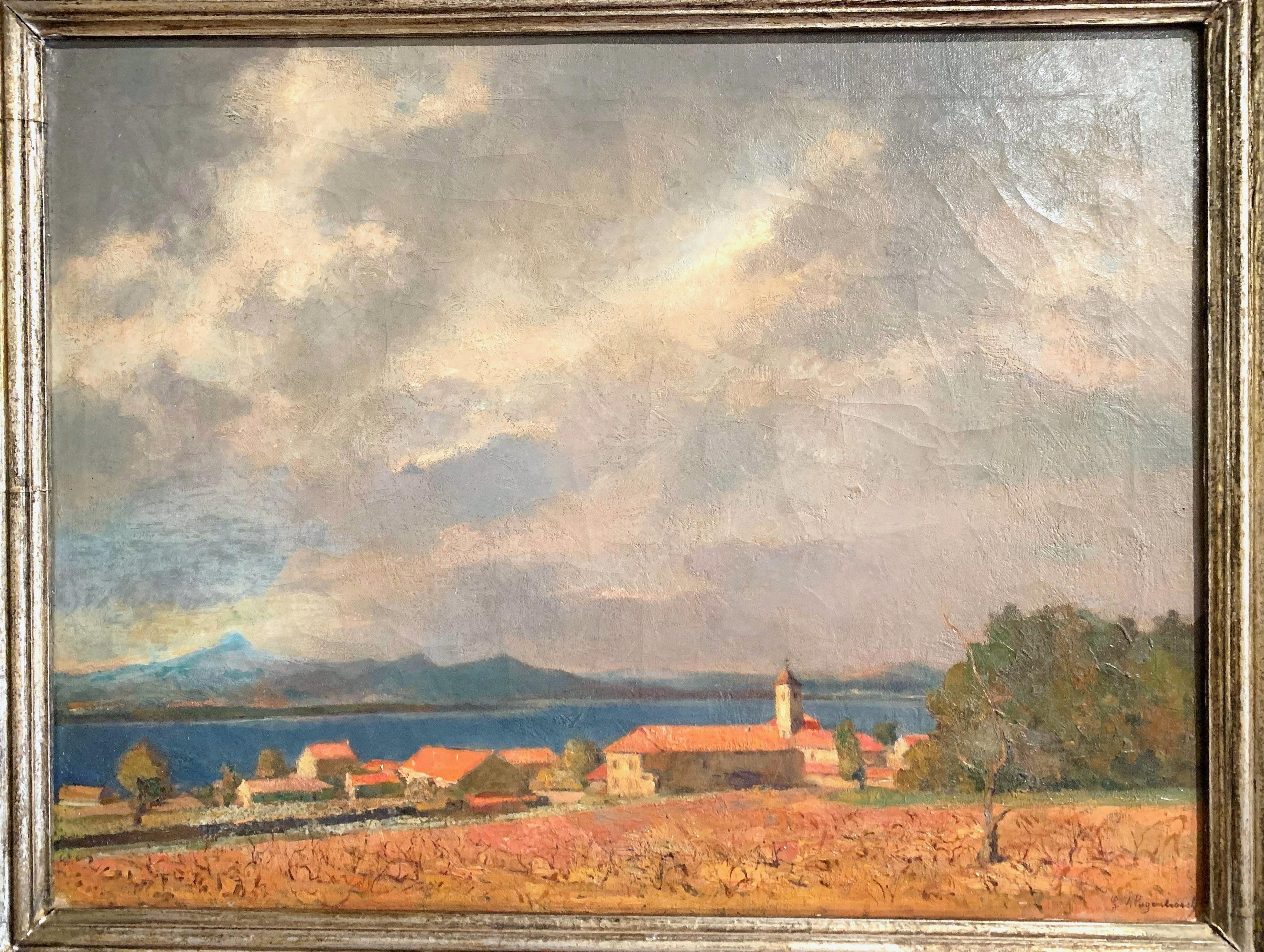 Set in the original silvered leaf frame and painted on canvas, the artwork depicts the island of Porquerolles on the French Riviera, in the south of France; it is signed in the lower right corner by the artist, Gregoor Van Puyenbroeck and dated on