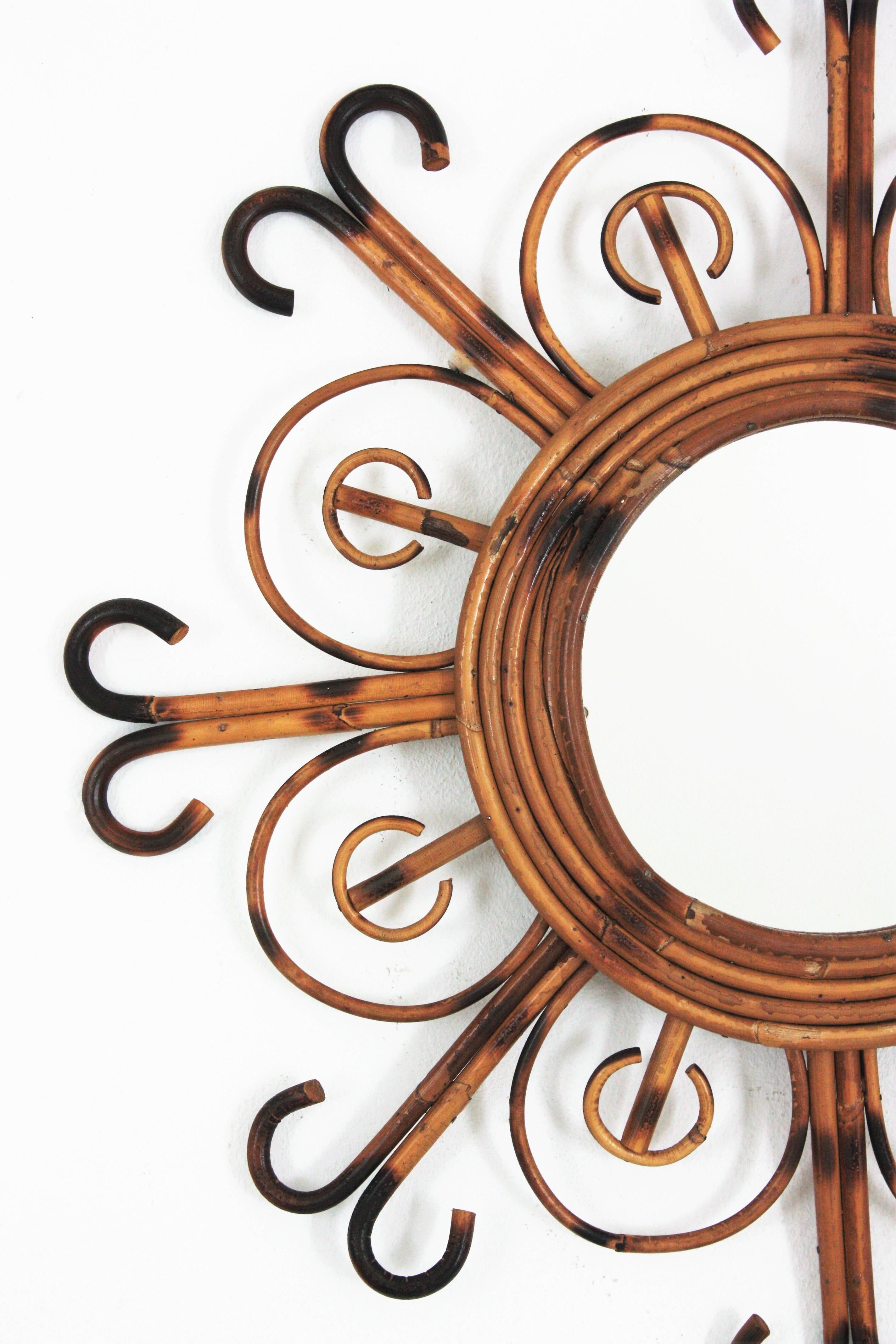Hand-Crafted French Riviera Rattan Sunburst Mirror, 1950s For Sale