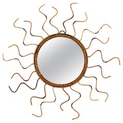 French Riviera Rattan Sunburst Mirror with Curly Rays & Pyrography Accents 1960s