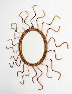 French Riviera Rattan Sunburst Mirror with Curly Rays, 1960s