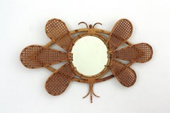 French Riviera Rattan Woven Wicker Butterfly Shaped Wall Mirror, 1950s