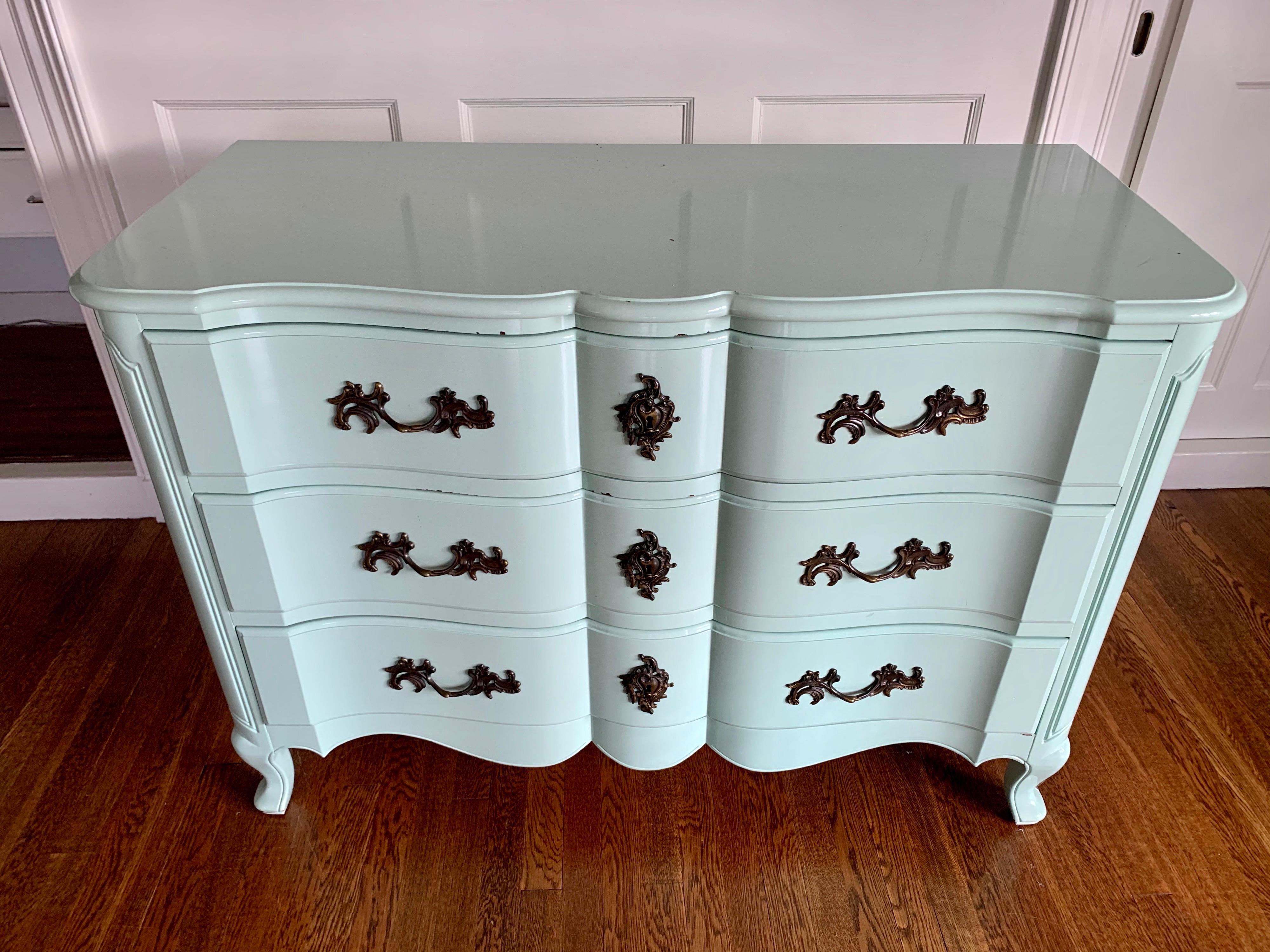 Magnificent French Provincial three-drawer lacquered chest of drawers, all original save for the stunning
robins egg blue lacquer. A special piece for your home. Now, more than ever, home is where the heart is.