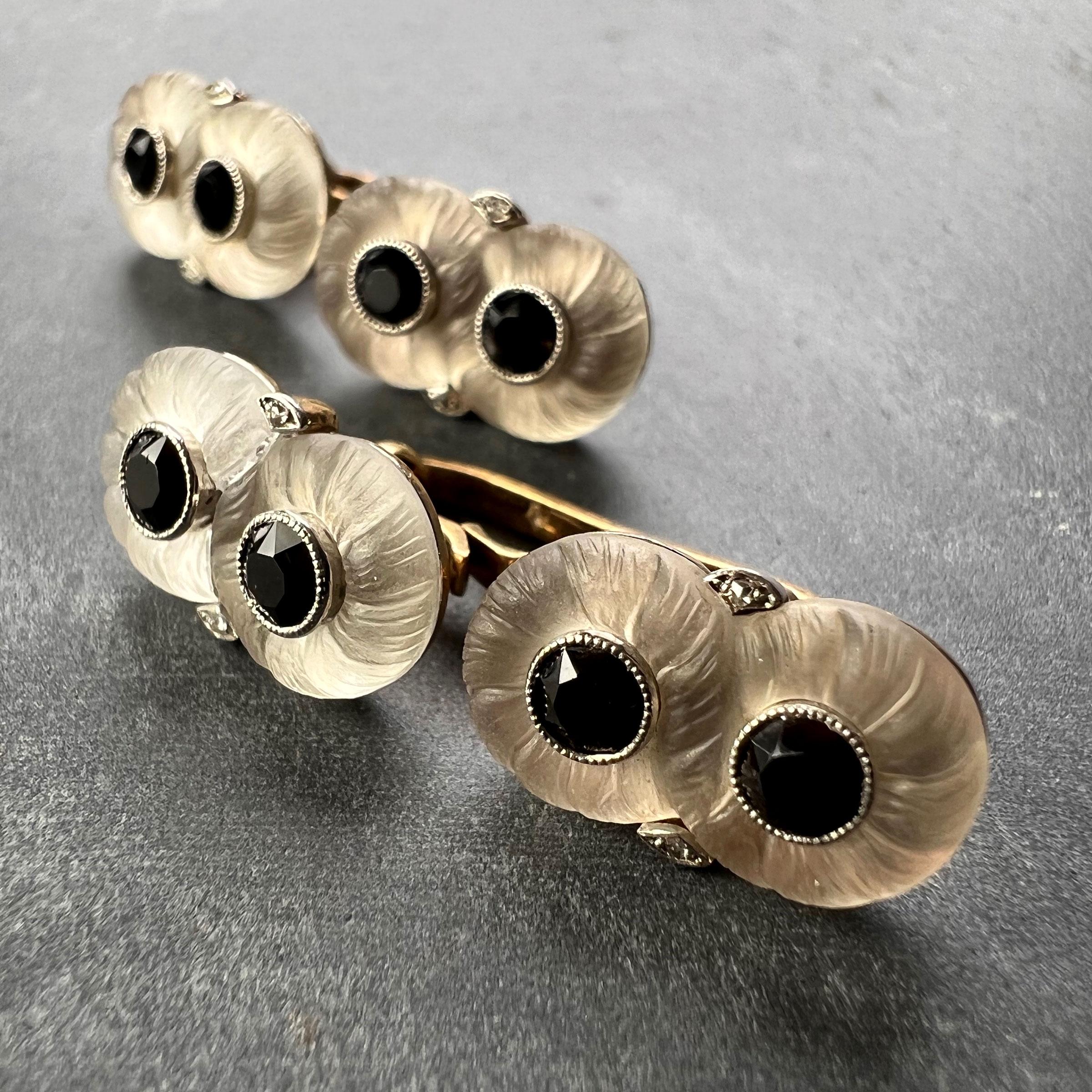 A pair of French 18K (18 karat) yellow gold cufflinks, each end designed as a double floral design in carved rock crystal set with two faceted onyx gems, further highlighted with rose-cut diamonds. Stamped with the eagle’s head for French