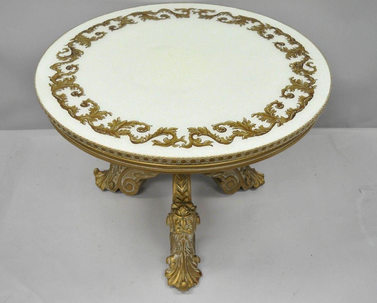 Antique French Rococo Baroque Style gold Italian round tall coffee table. Item features solid wood carved pedestal base, gold gilt hand-painted glass top with rainbow color and unique tall form. circa mid-20th century. Measurements: 25