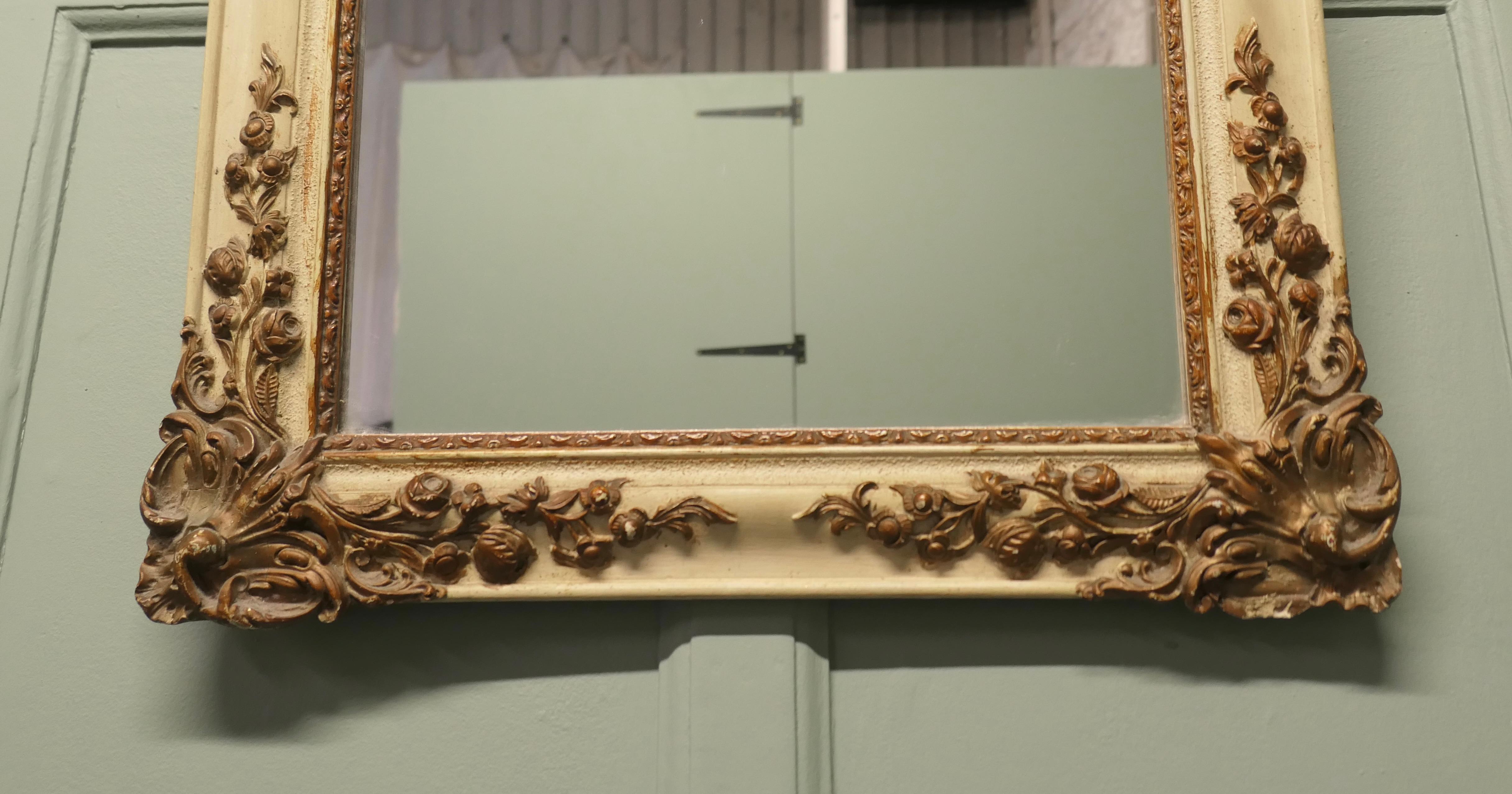 Early 20th Century French Rococo Gilt and Cream Wall Mirror For Sale