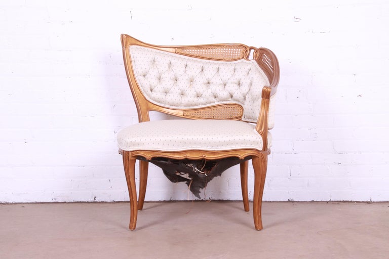 French Rococo Louis XV Giltwood and Cane Upholstered Fireside Chair  Attributed to Grosfeld House