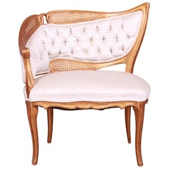 French Rococo Louis XV Giltwood and Cane Upholstered Fireside Chair