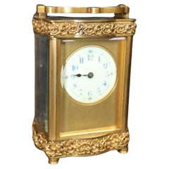 Horloge à chariot de style Louis XV français rococo en bronze et bronze doré