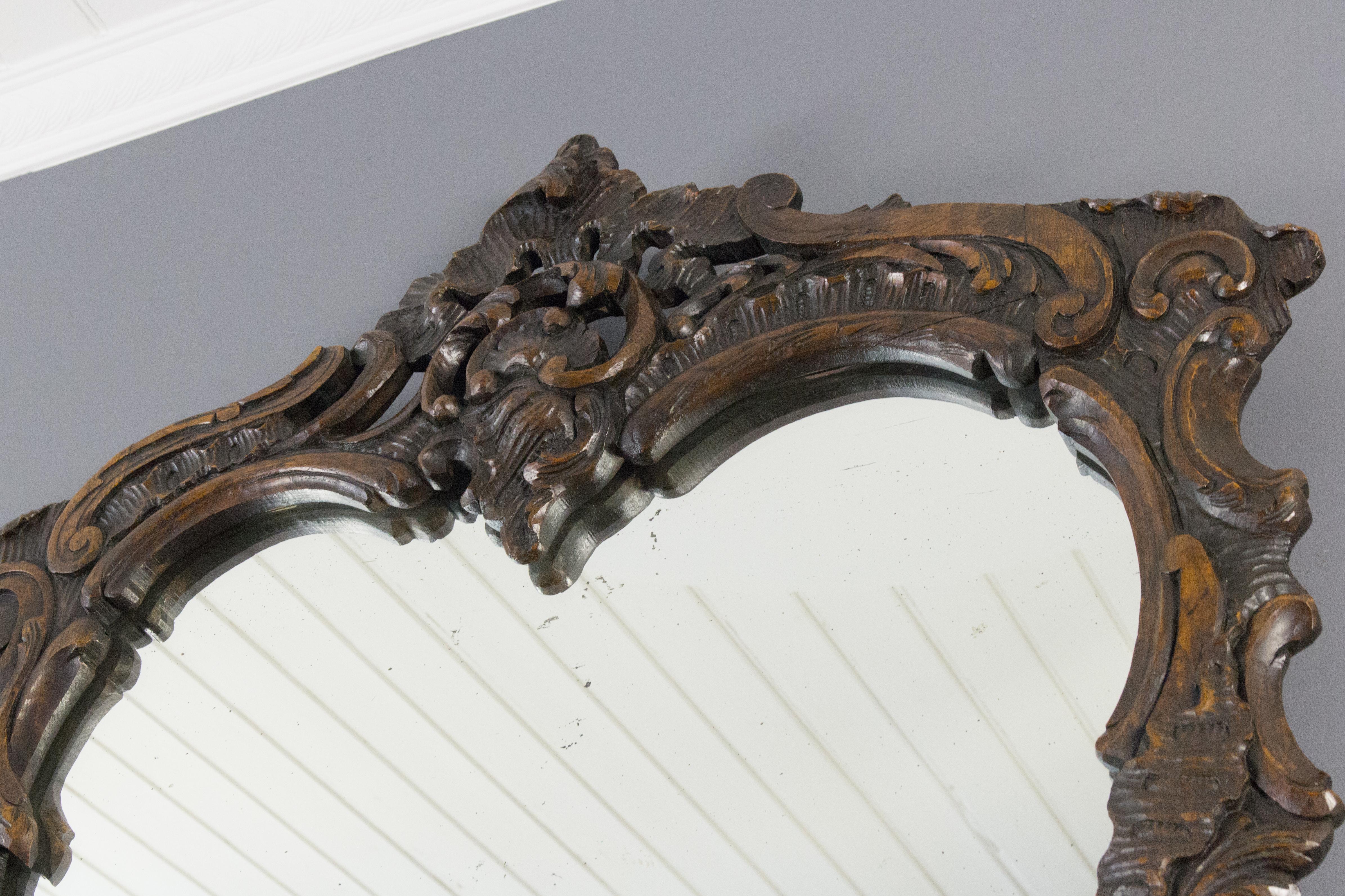 Hand-Carved French Rococo Style Ornate Carved Wood Dark Brown Wall Mirror Early 20th Century For Sale