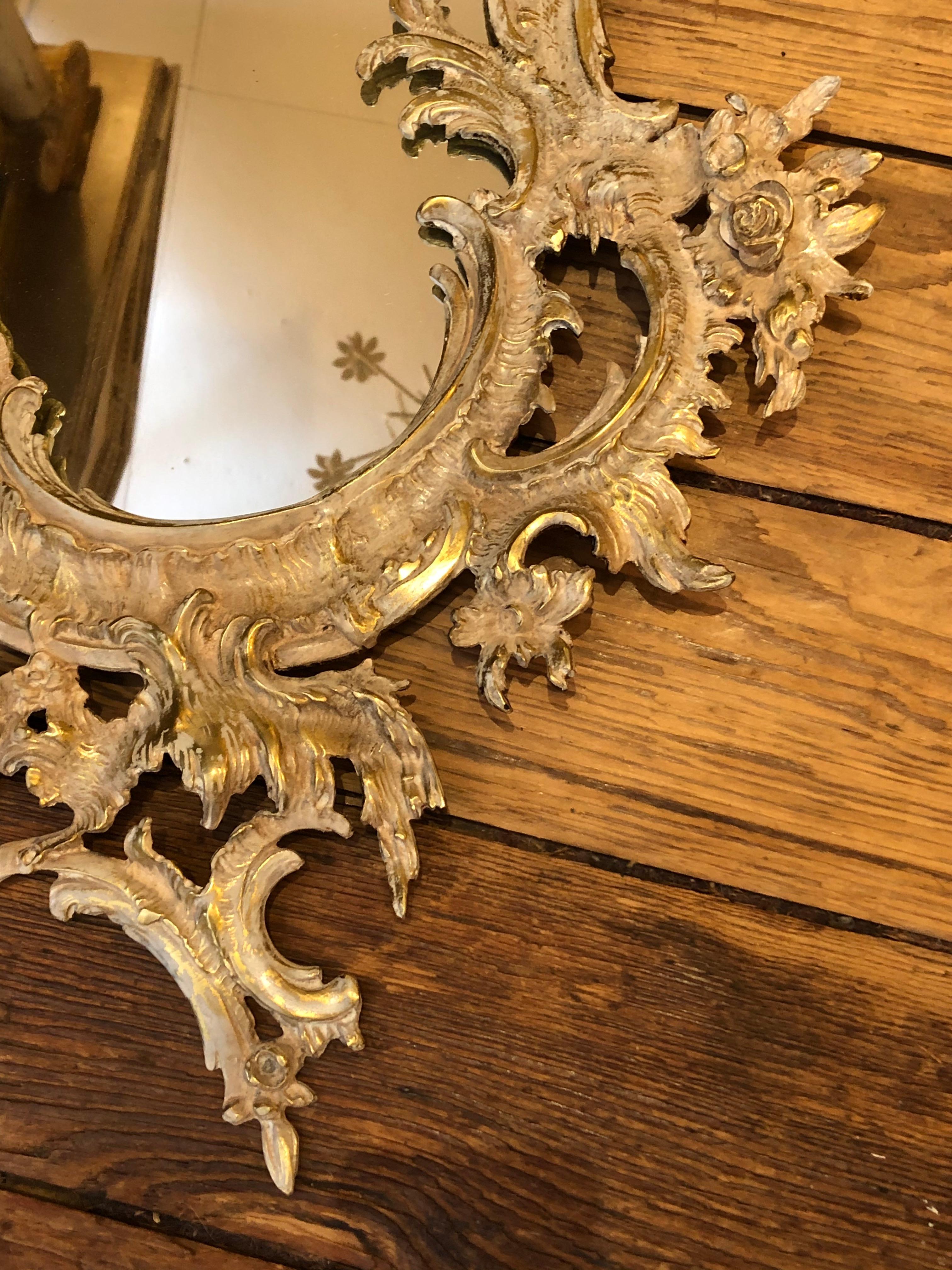 French Rococo Style Relief Cast Brass and Antiqued Cartouche Shaped Wall Mirror 4